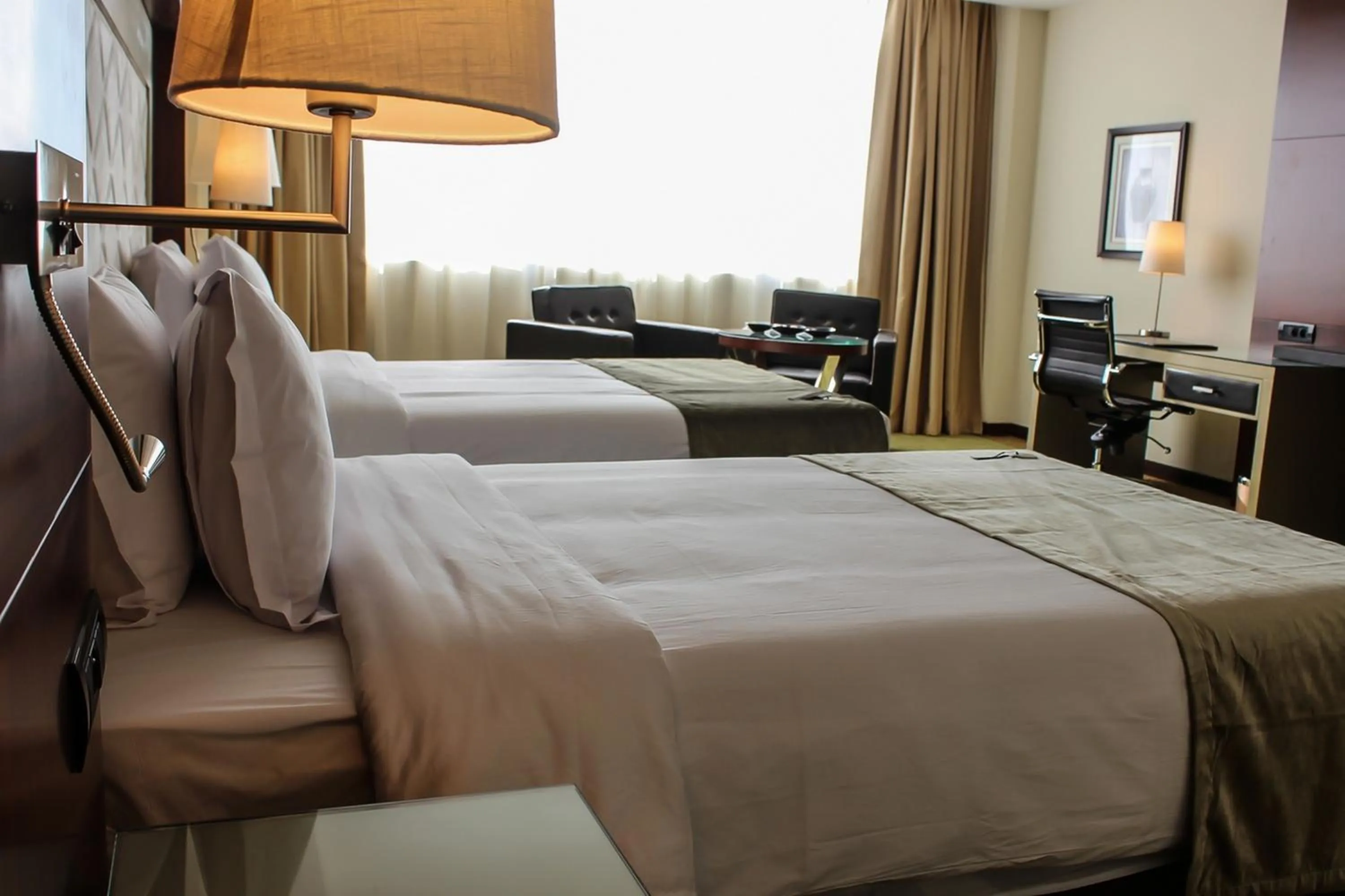 Photo of the whole room, Bed in Grand Mogador City Center