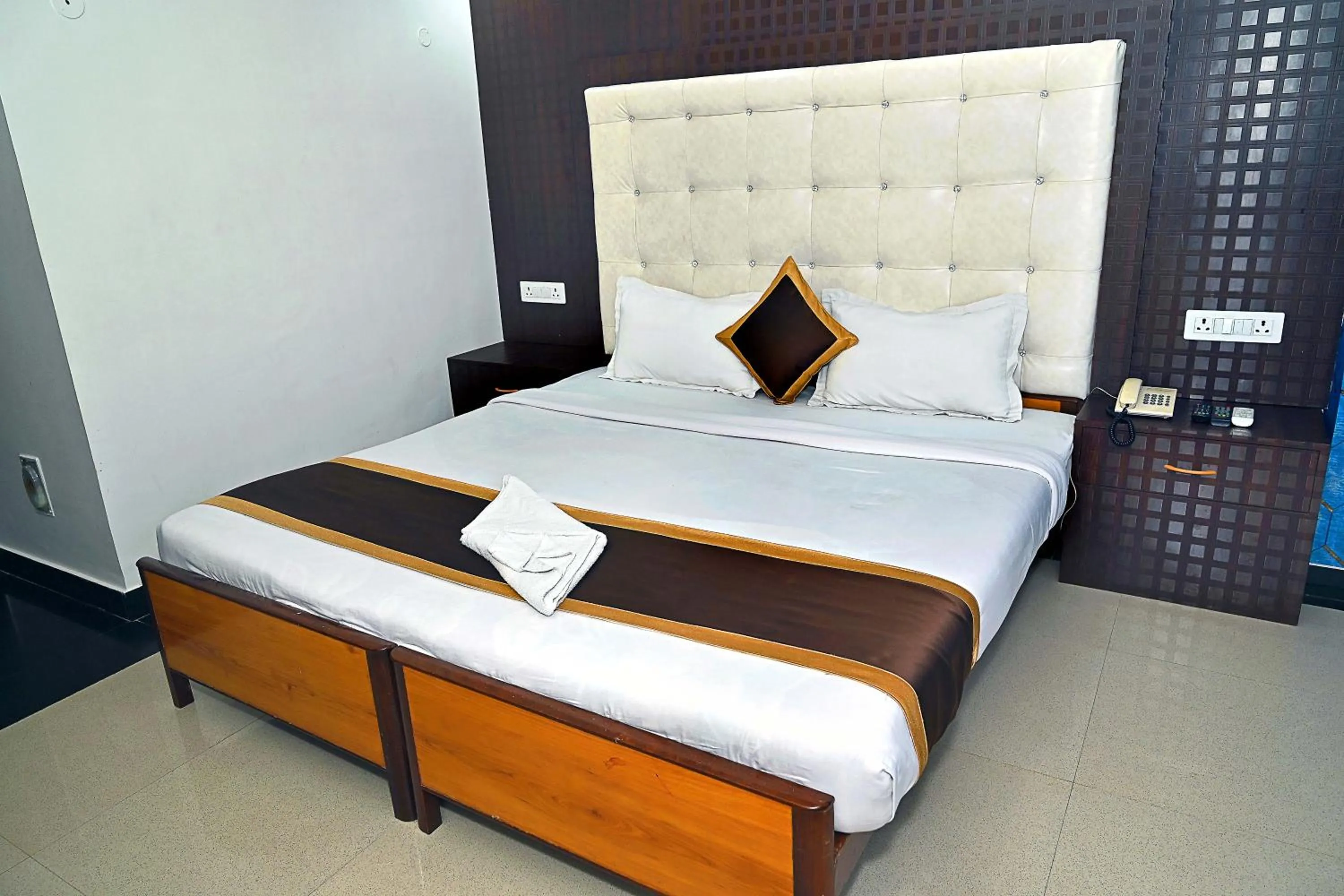 Bed in Hotel Rajhans International