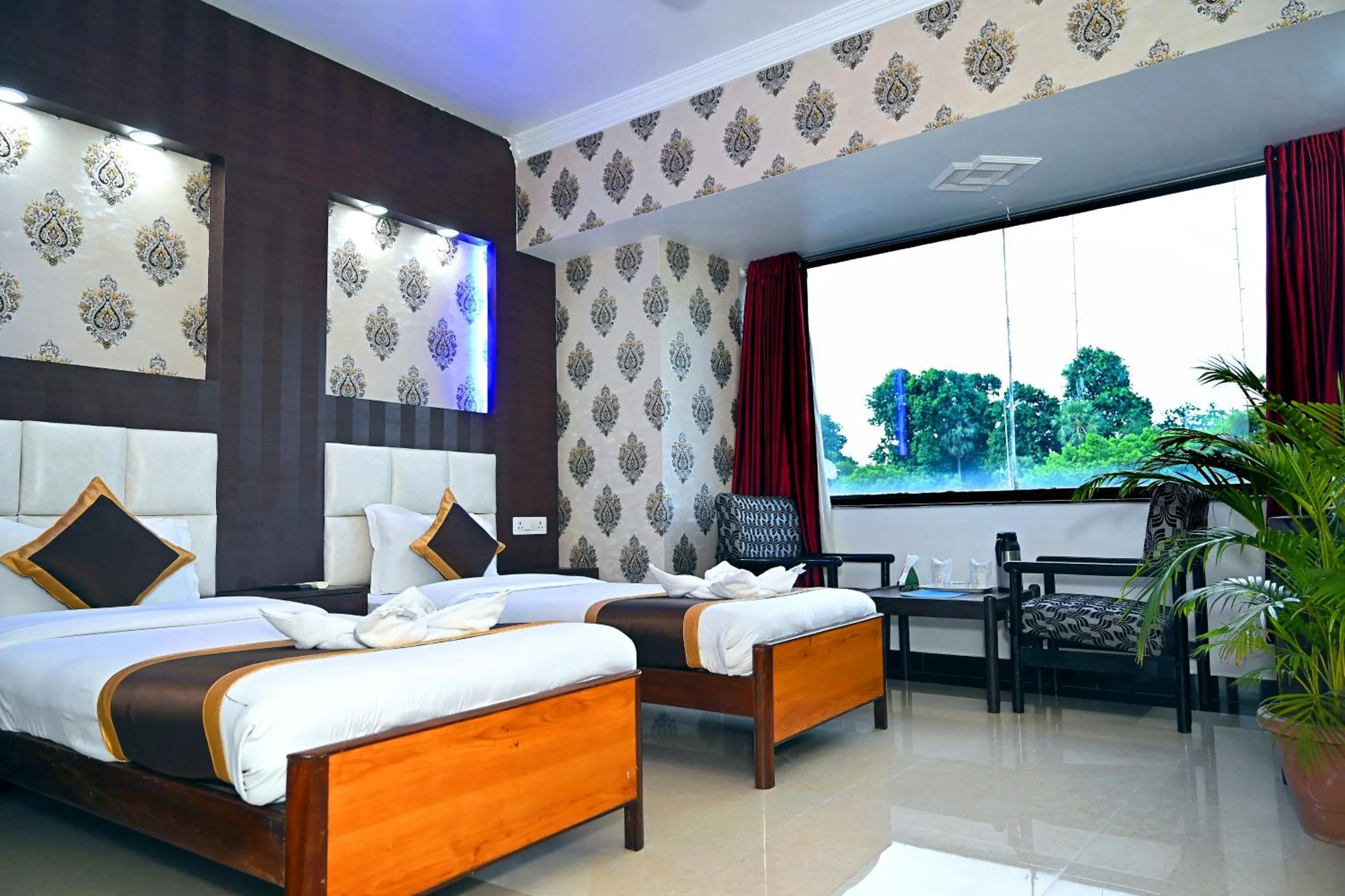 Bedroom in Hotel Rajhans International