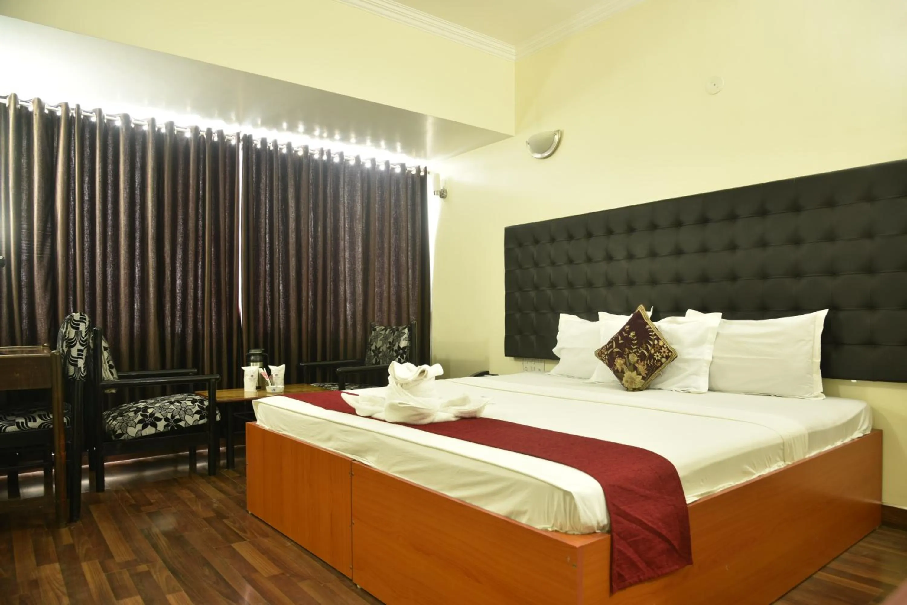 Bed in Hotel Rajhans International