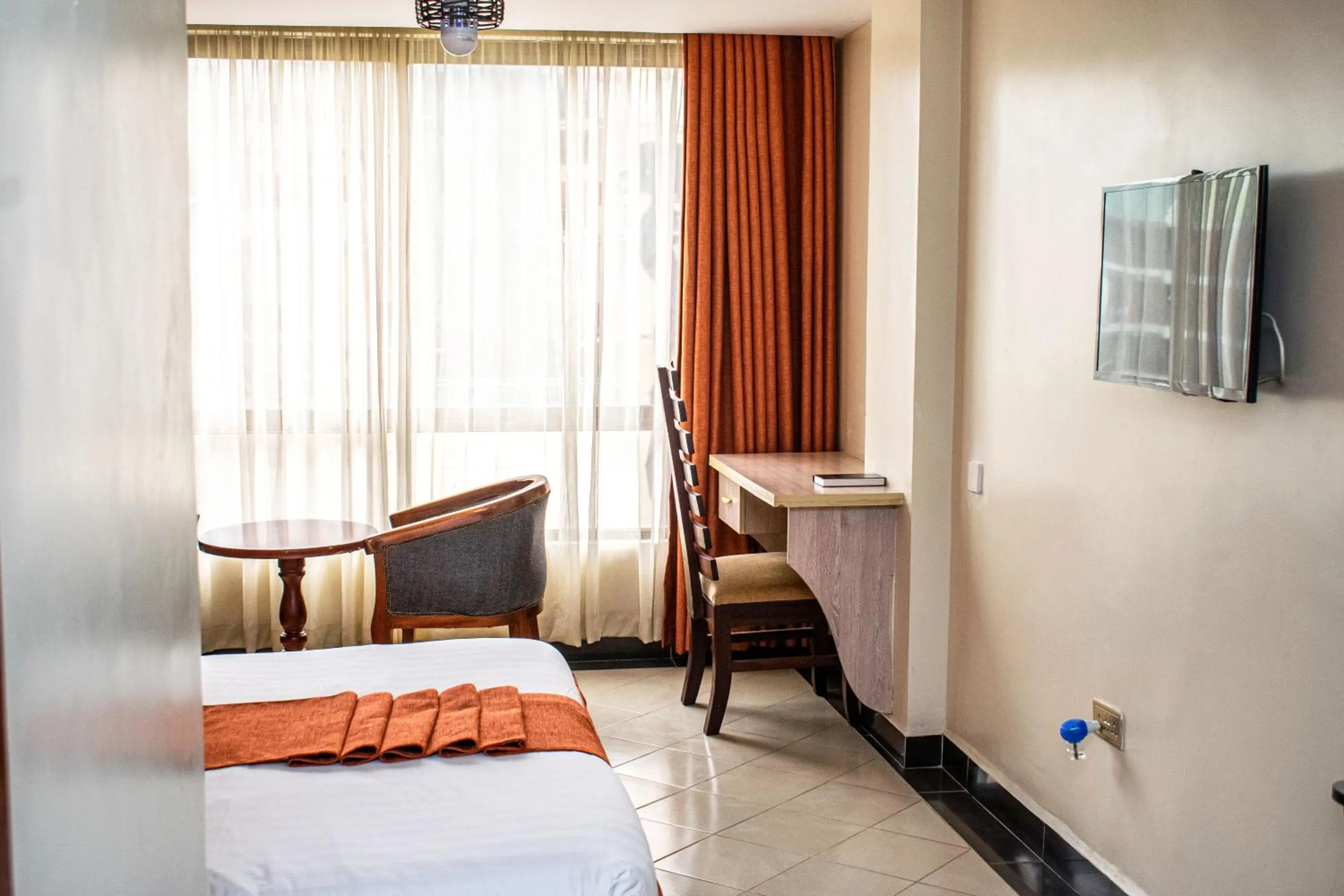 Bed in Astorian Grand Hotel Naivasha