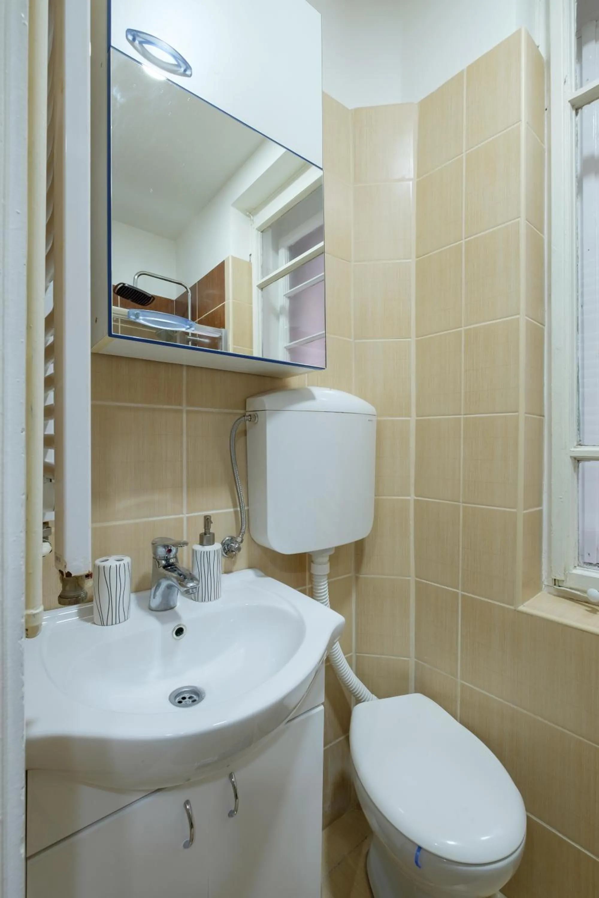 Toilet in M&M Downtown Apartment