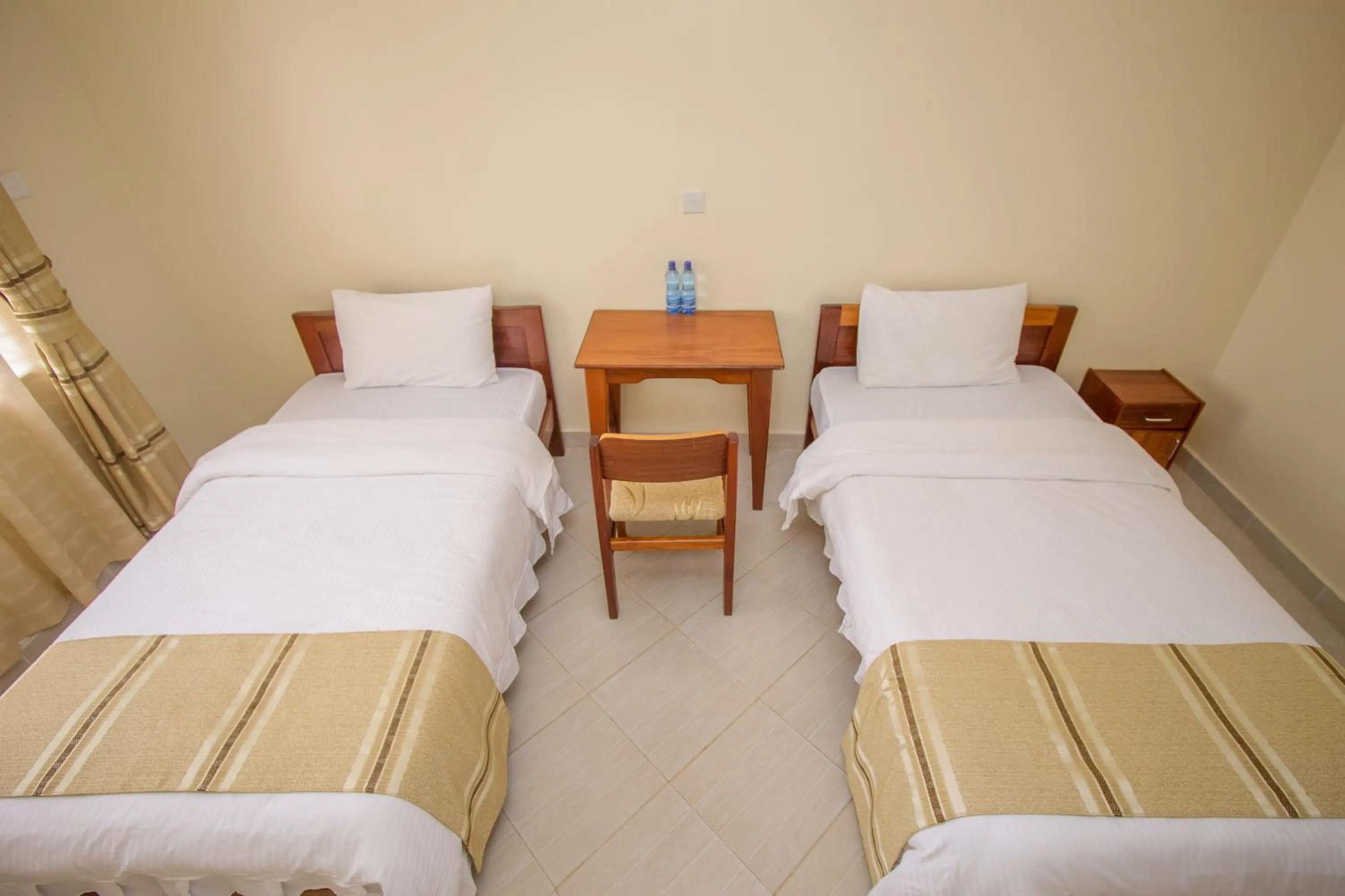 Bed in Corat Africa Hotel