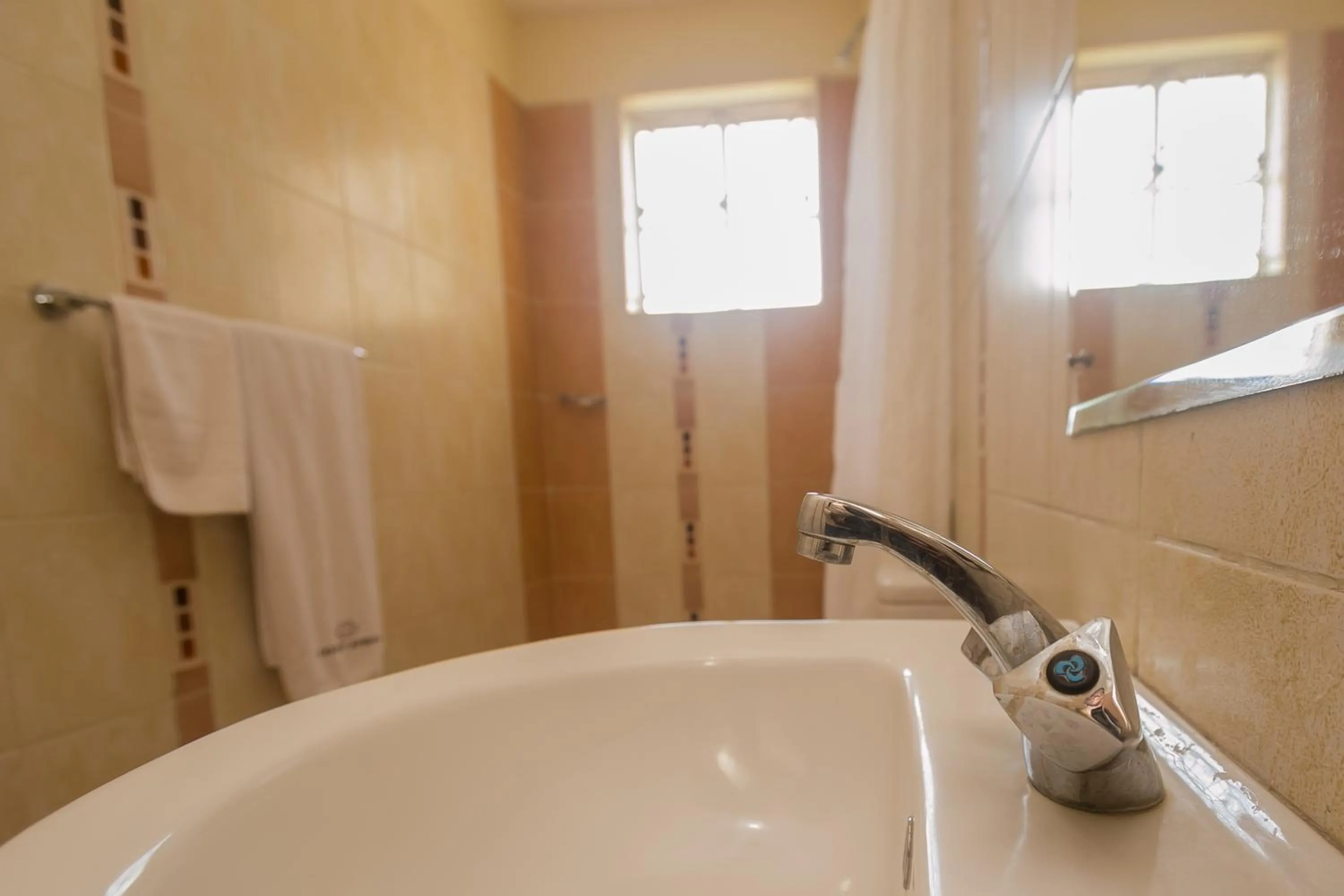 Shower in Corat Africa Hotel