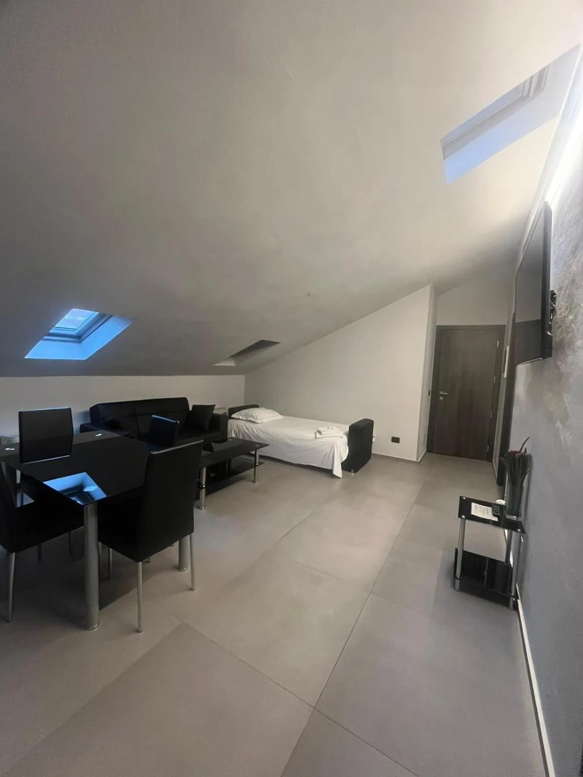 Living room, Bed in Hotel Duomo