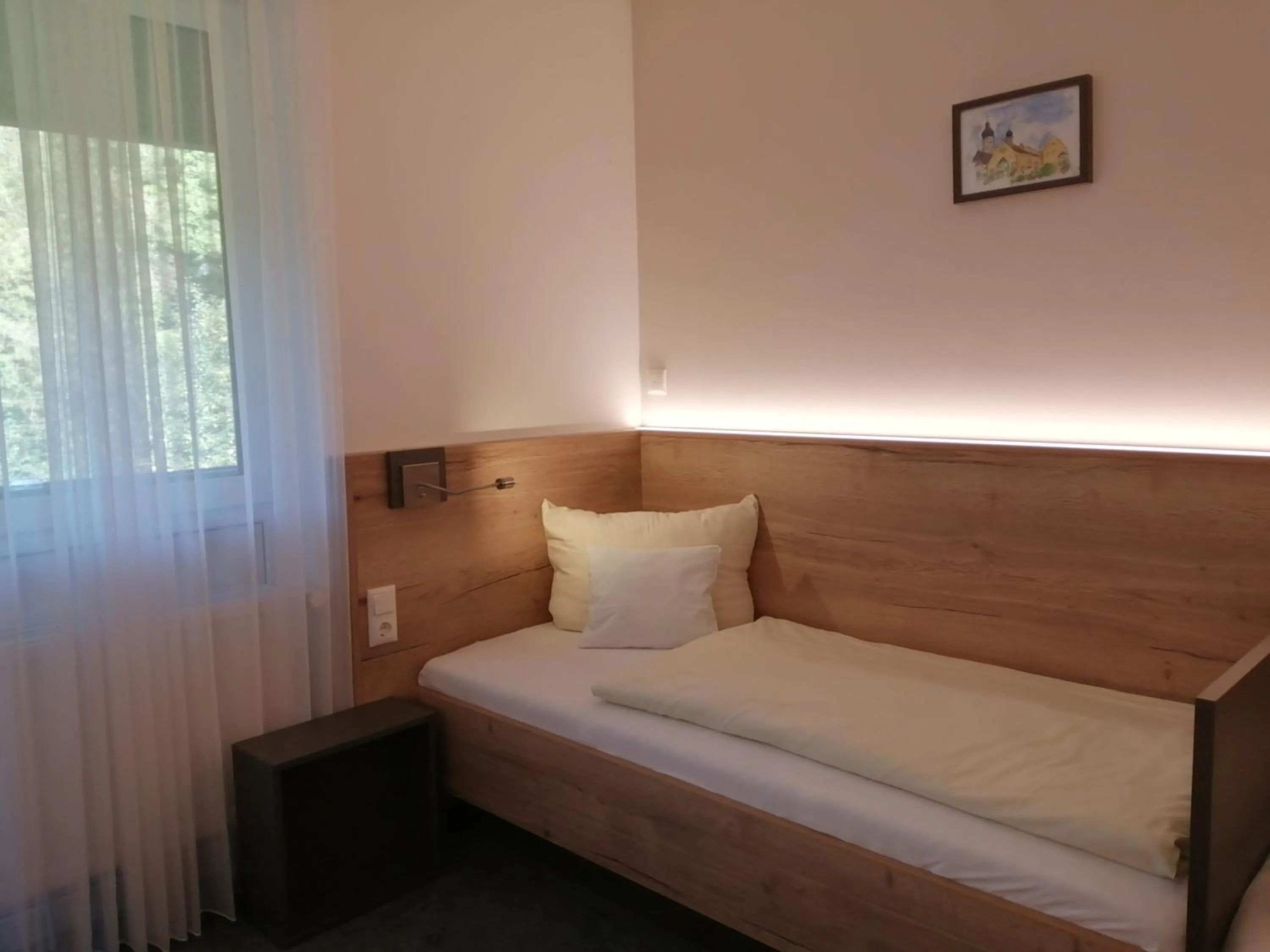 Bed in Hotel am Regenbogen