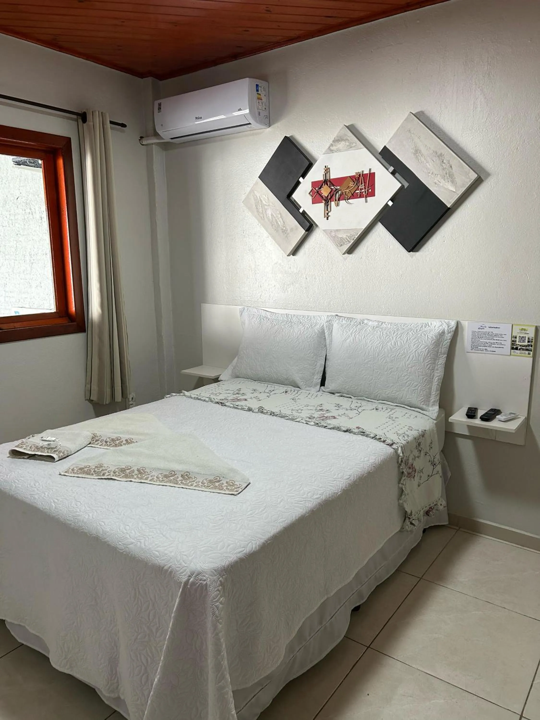 Bed in Pousada Angela