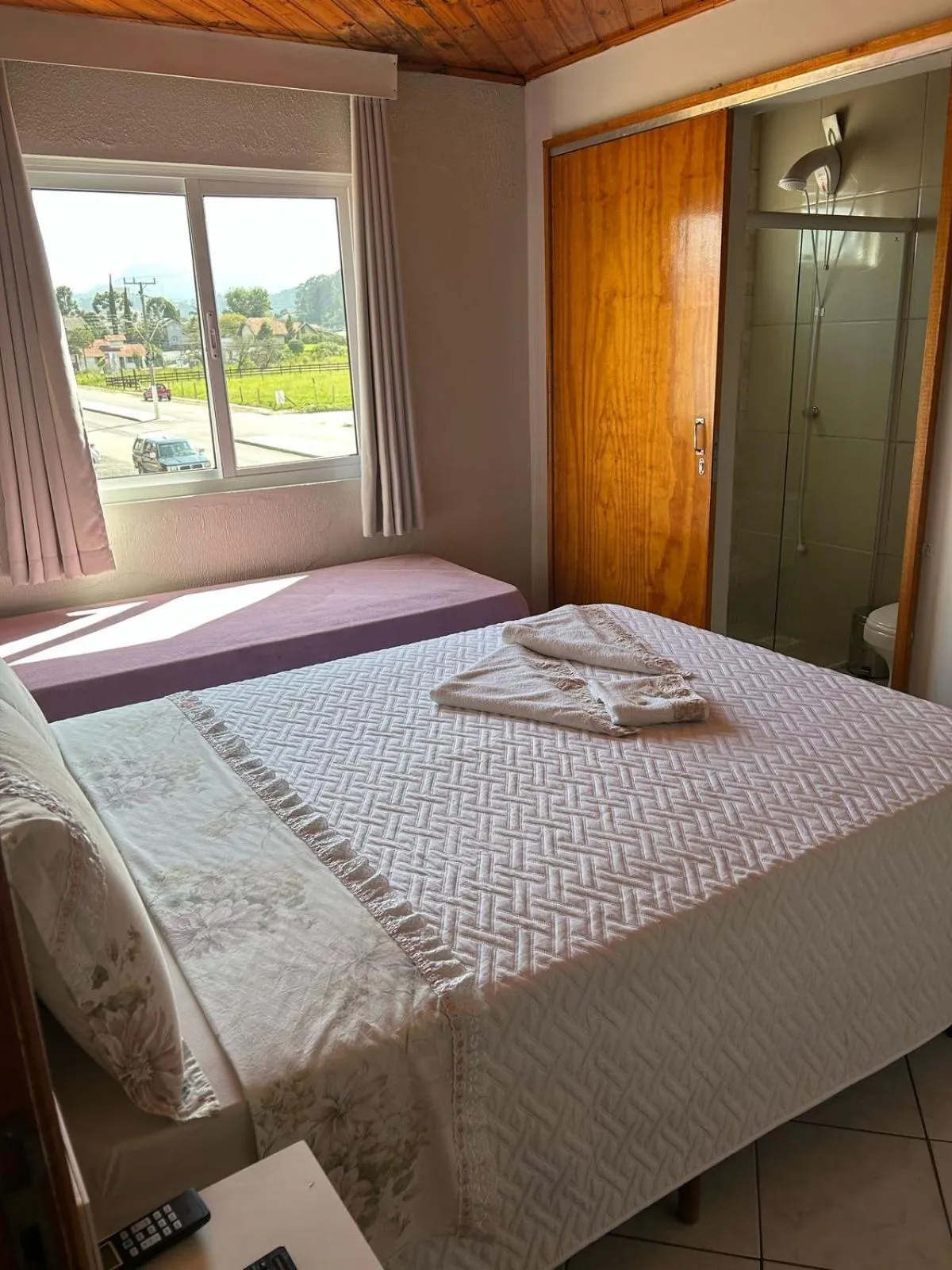 Bed in Pousada Angela