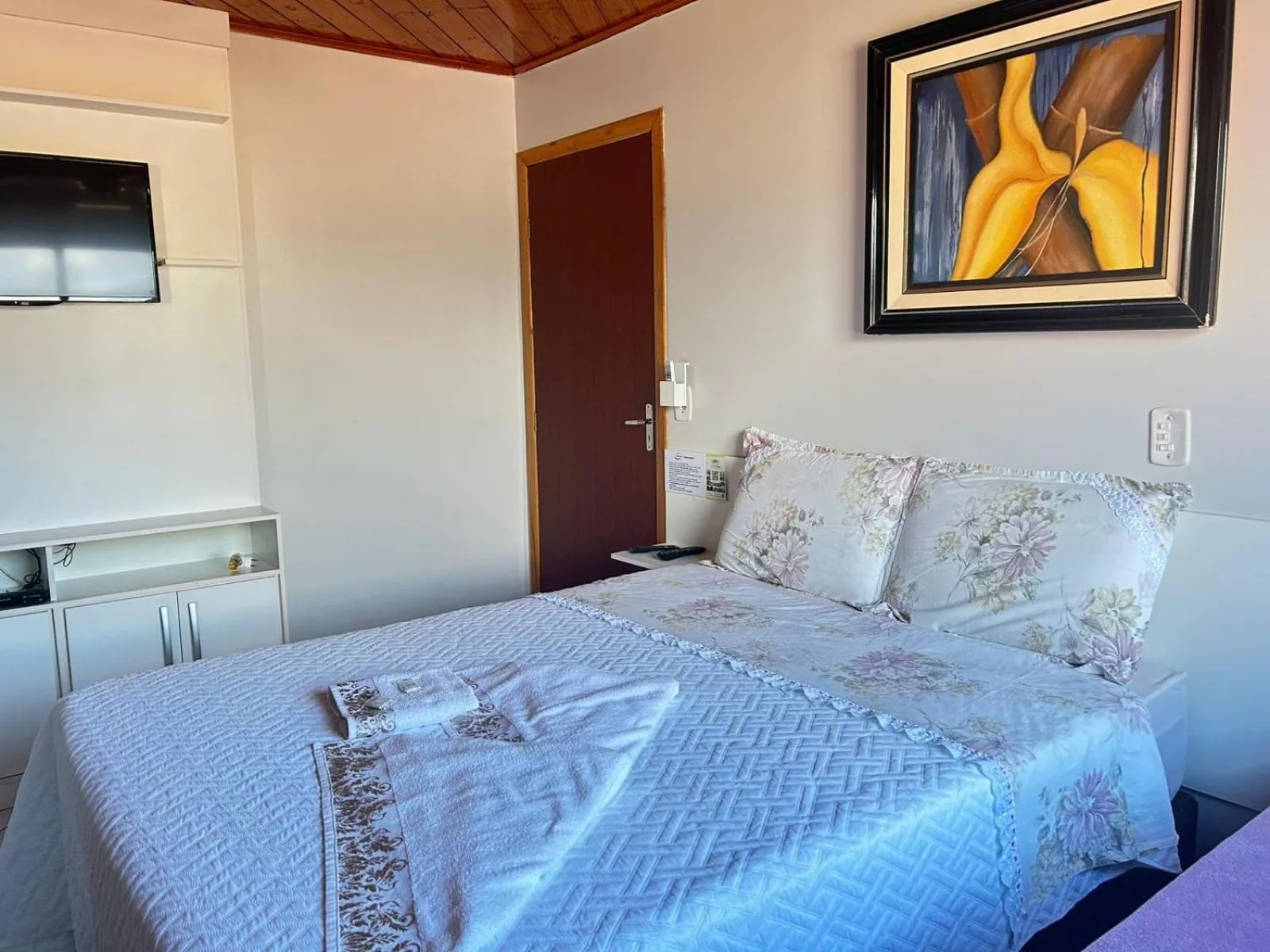 Bed in Pousada Angela