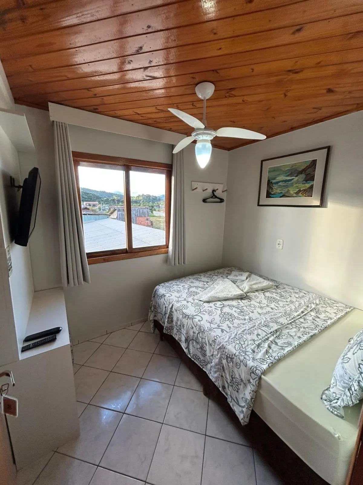 Bed in Pousada Angela