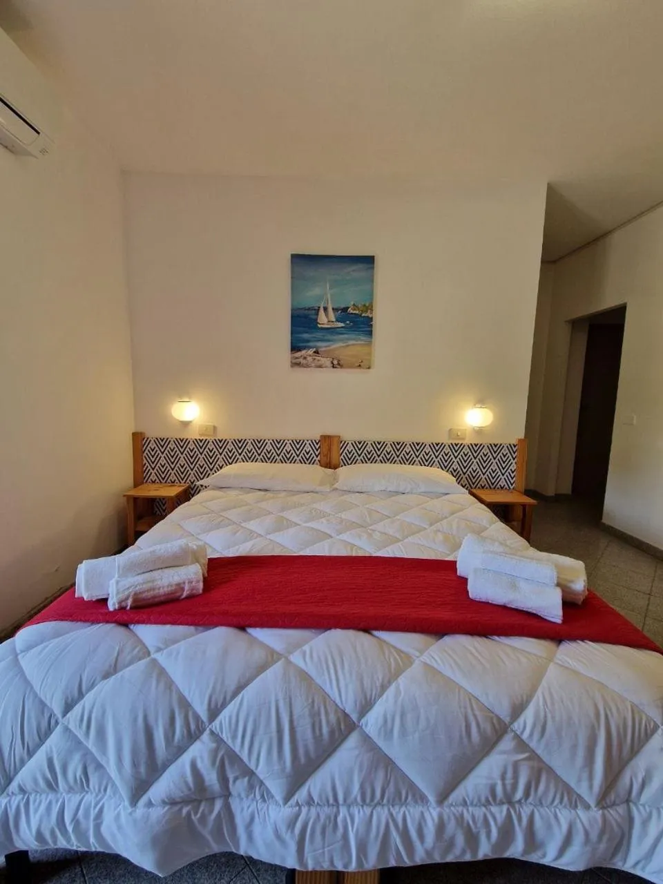 Bed in Hotel Mistral