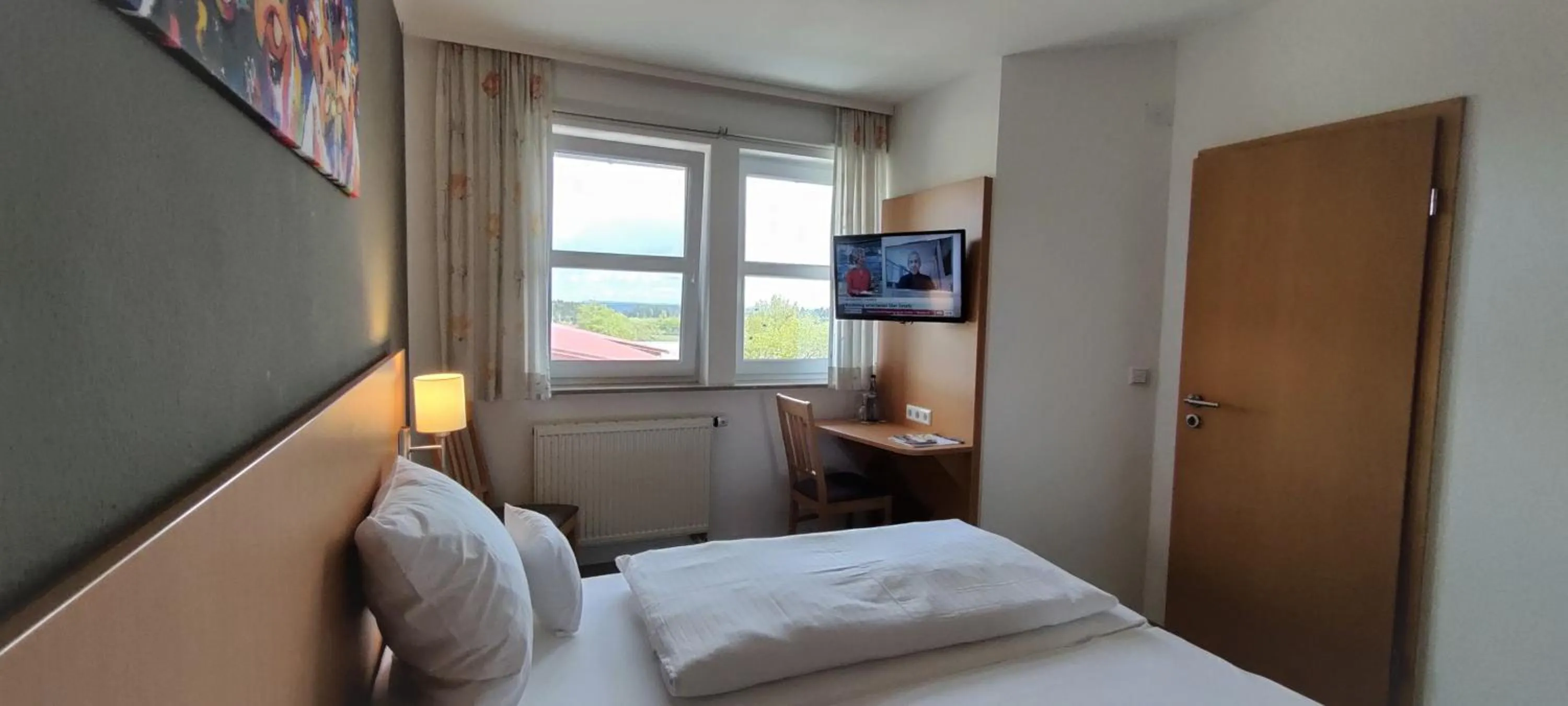 Photo of the whole room, Bed in Brigel-Hof