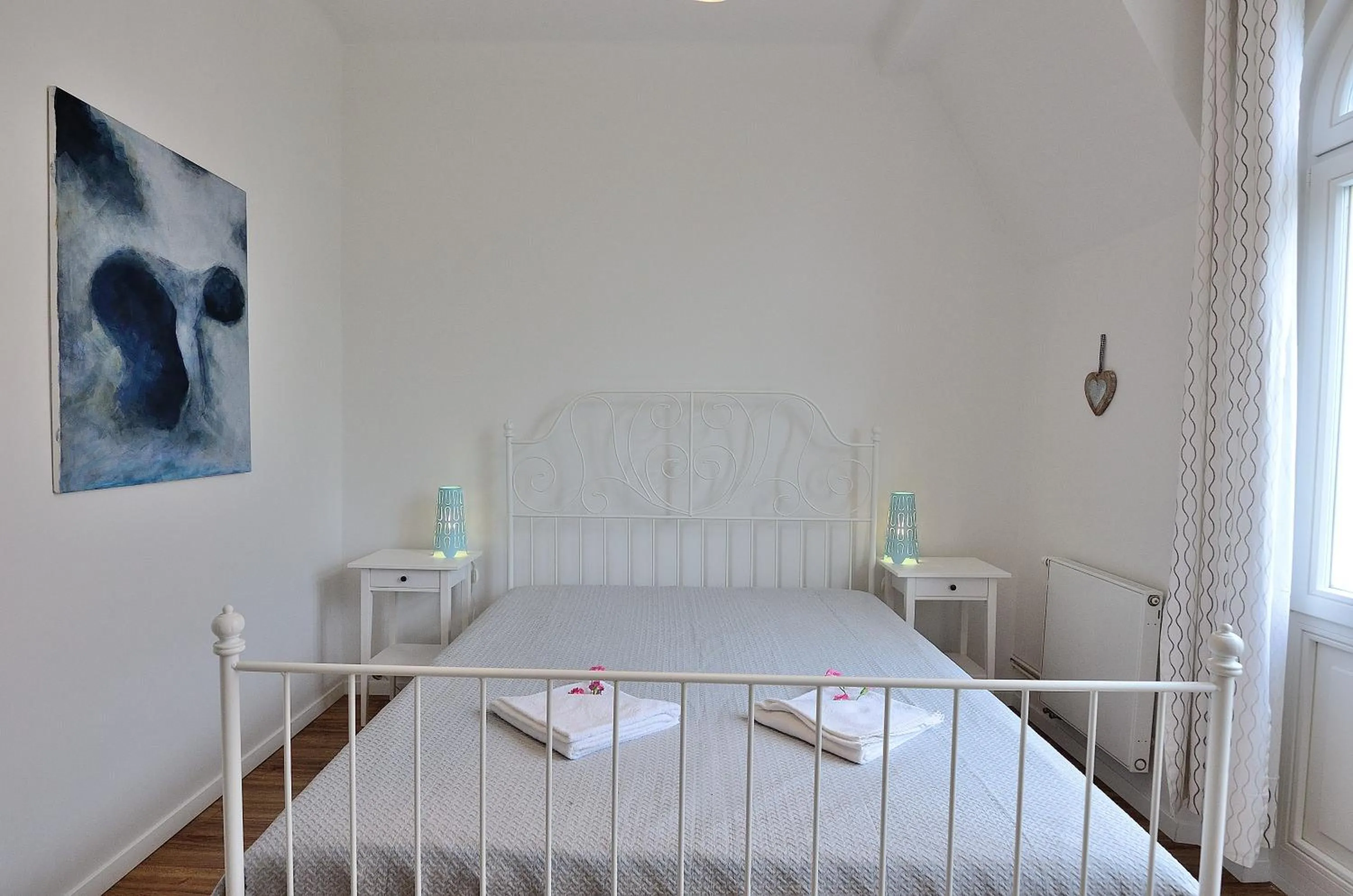 Bed in Victus Apartamenty, Apartamenty Adams
