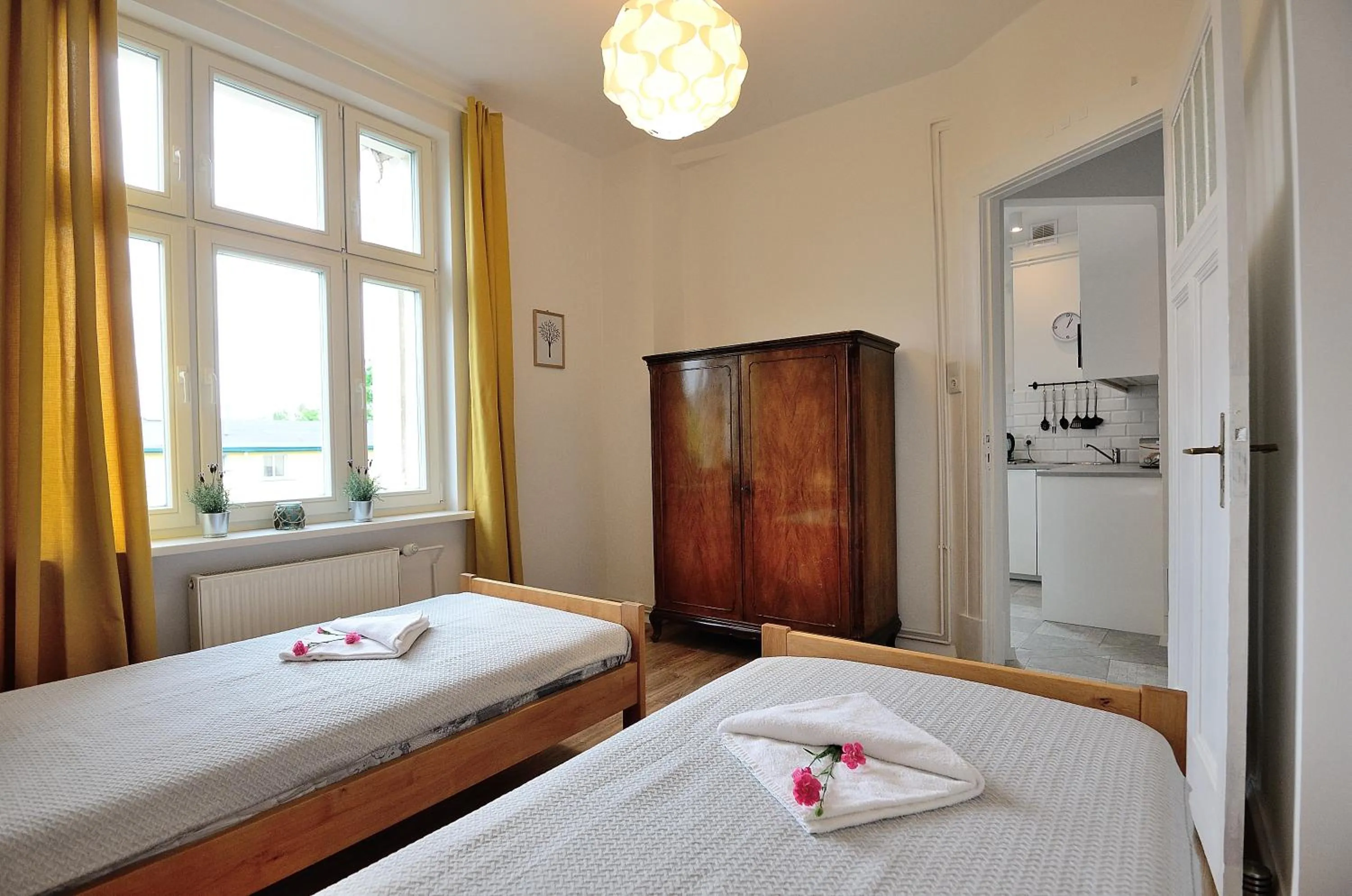 Bed in Victus Apartamenty, Apartamenty Adams