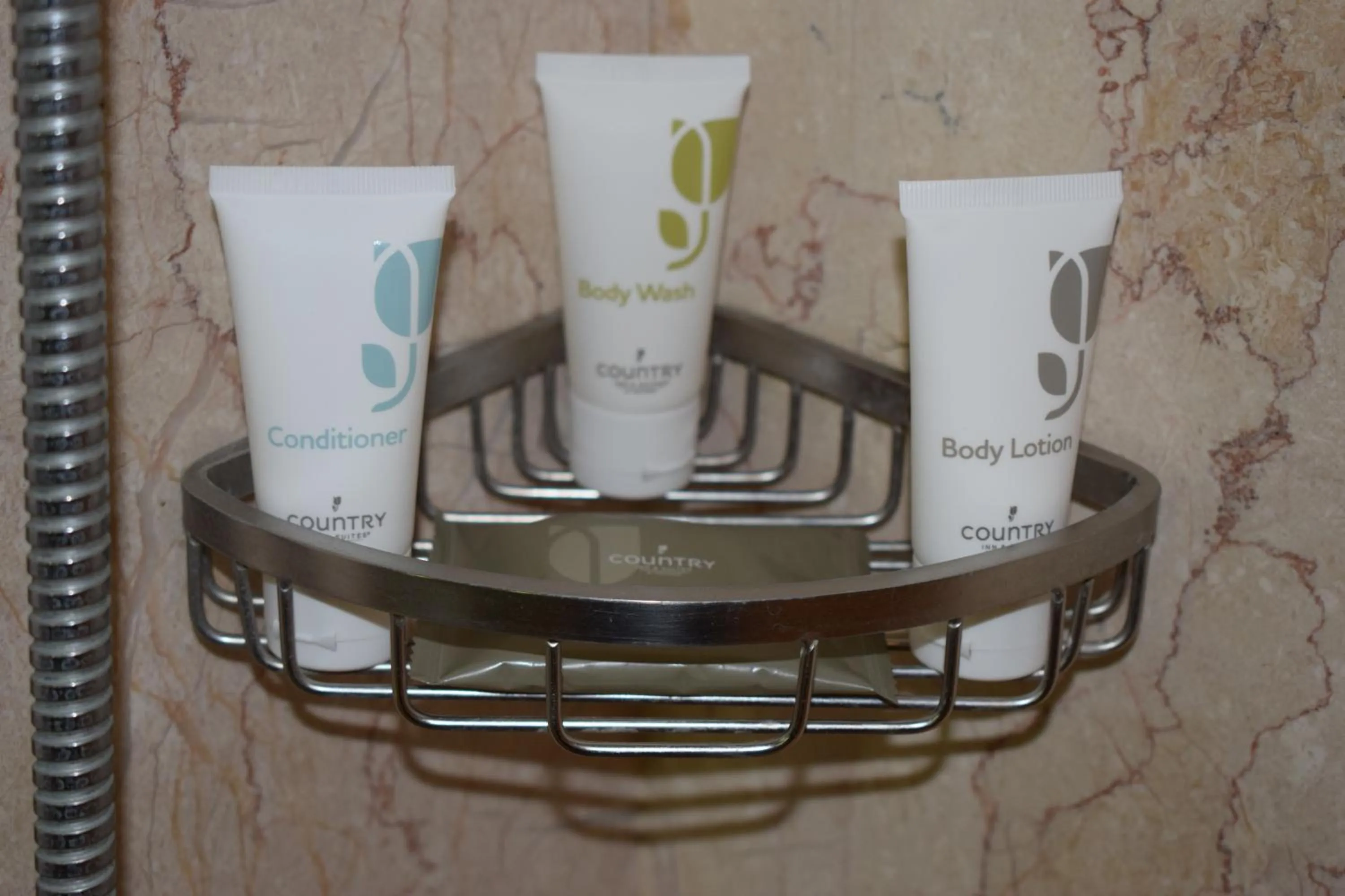 Bathroom in Country Inns & Suites By Radisson Manipal