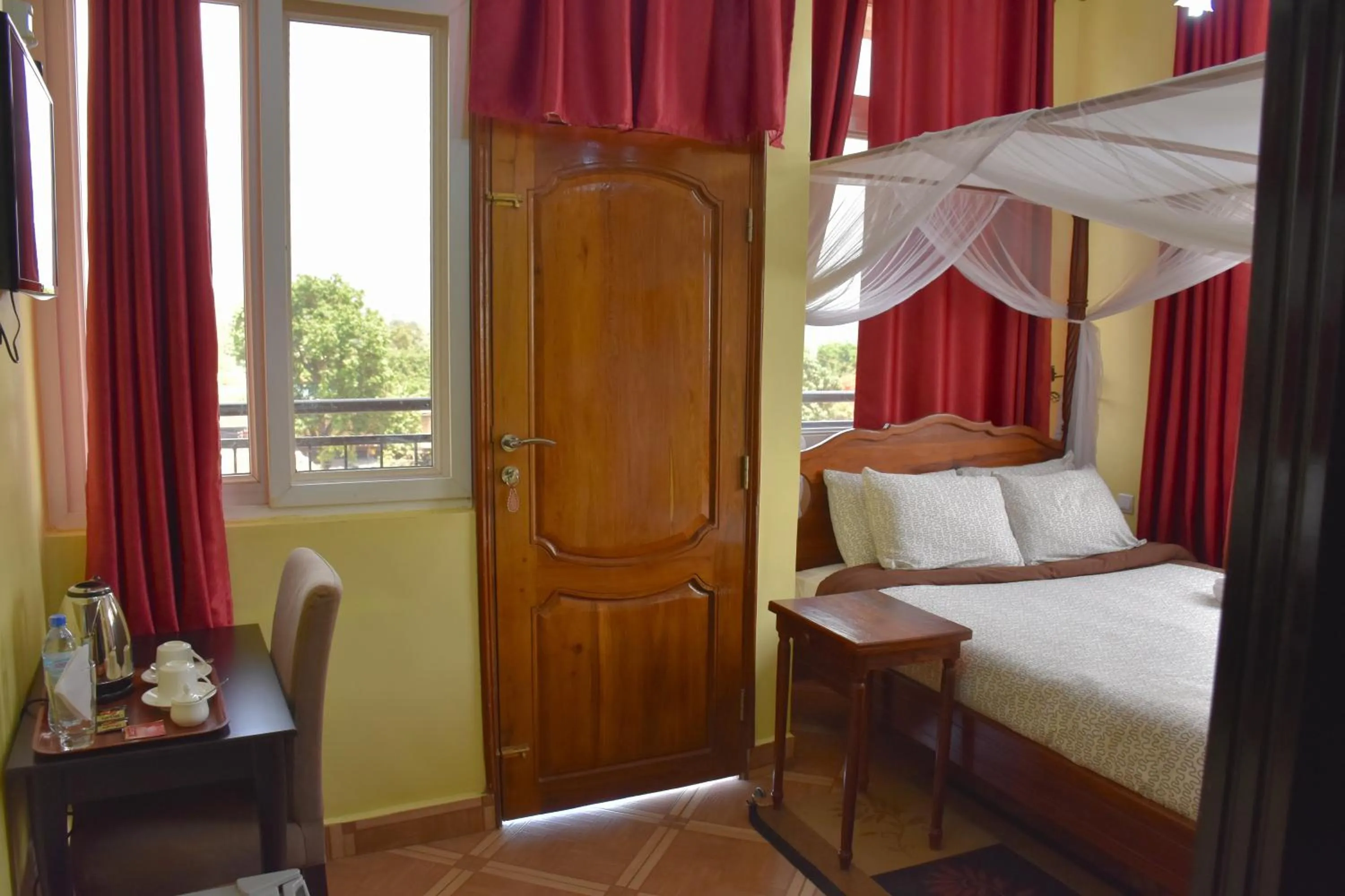 Bed in East Point Hotel Moshi