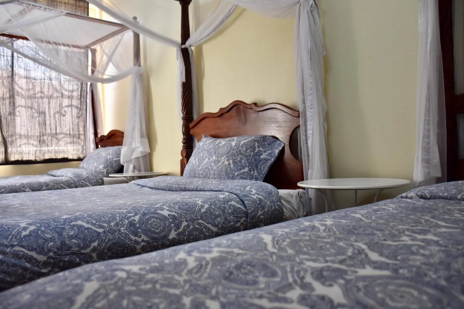 Bed in East Point Hotel Moshi