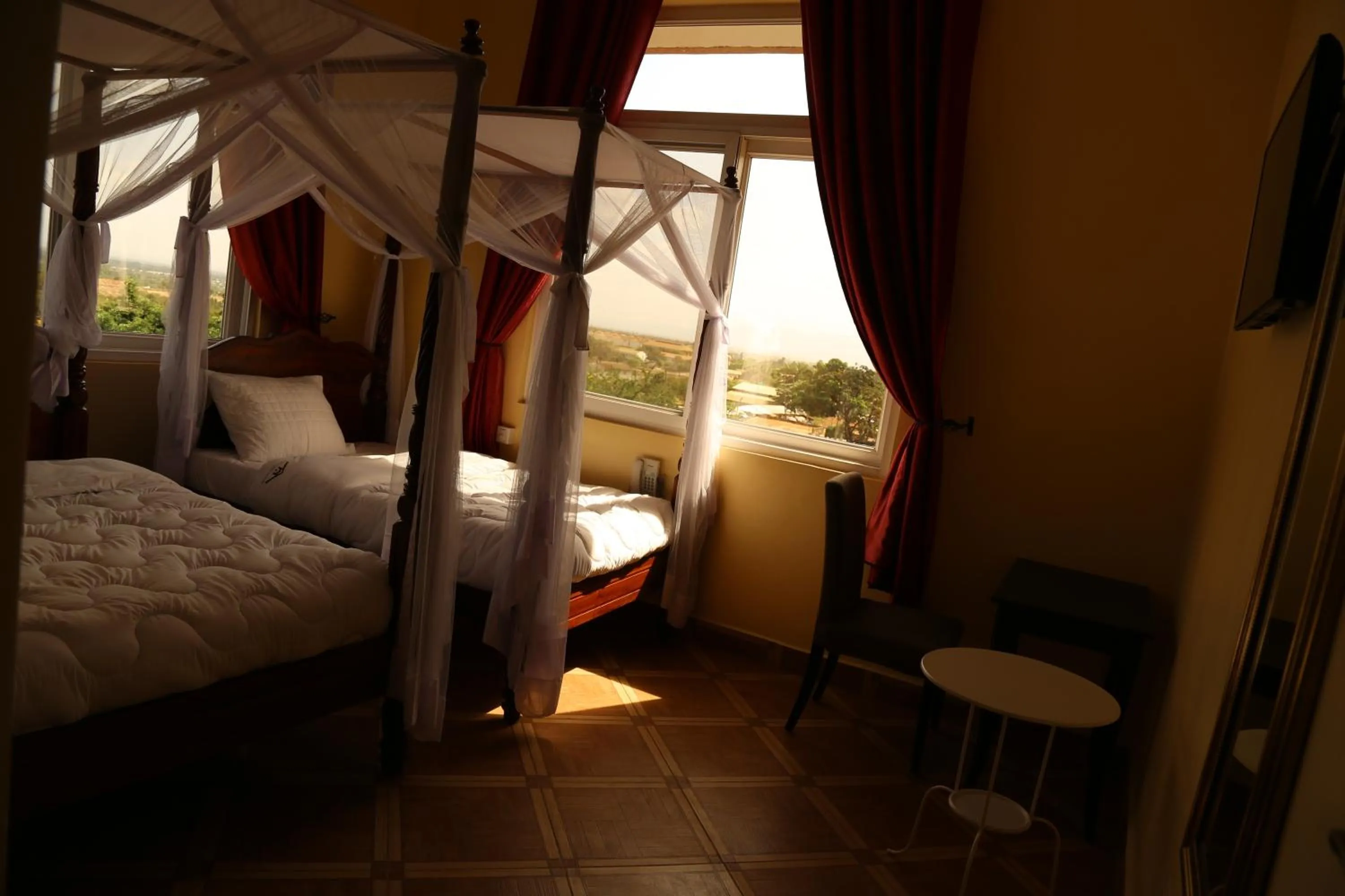 Bed in East Point Hotel Moshi