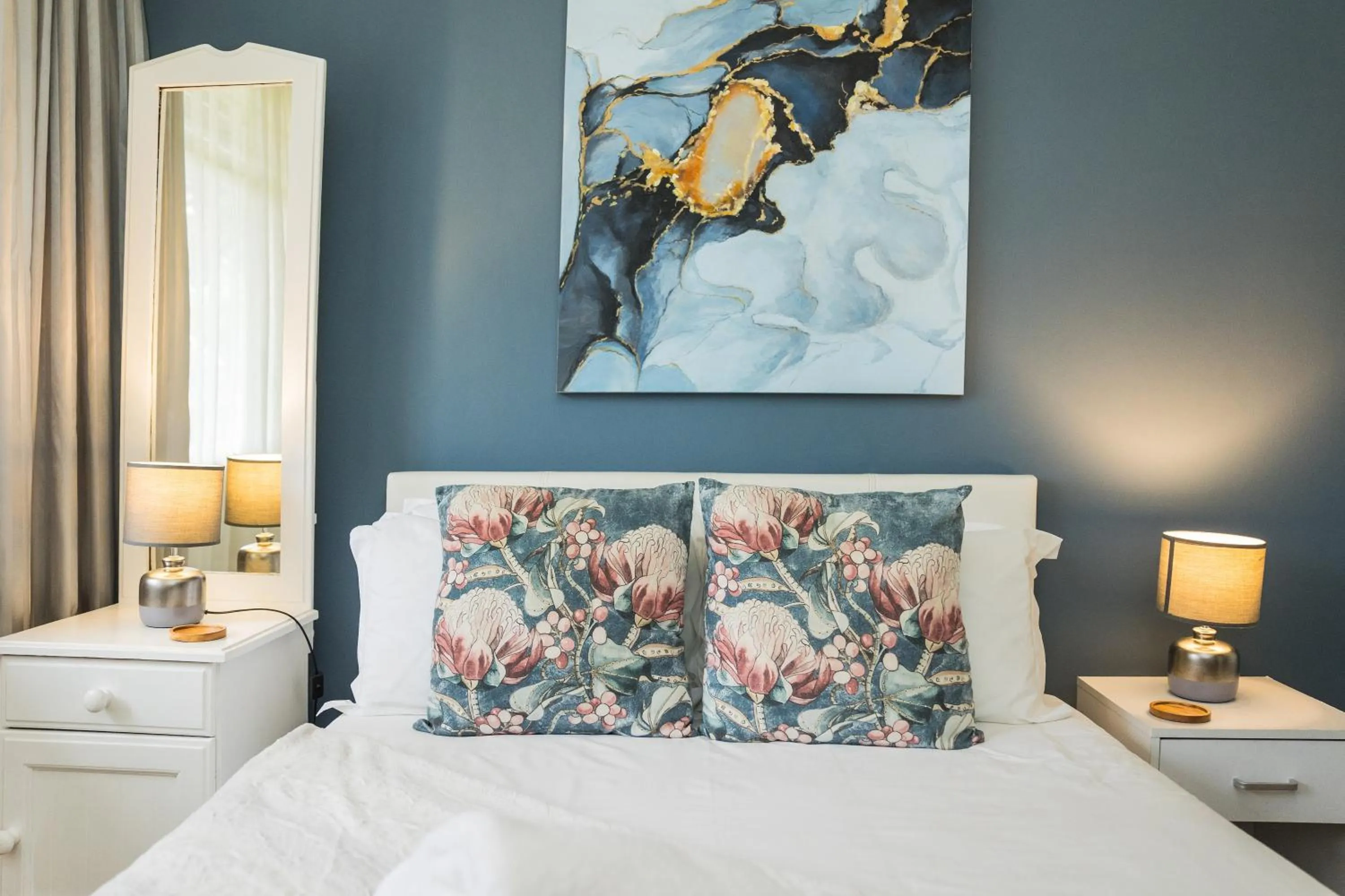 Bed in Rozendal Guest House