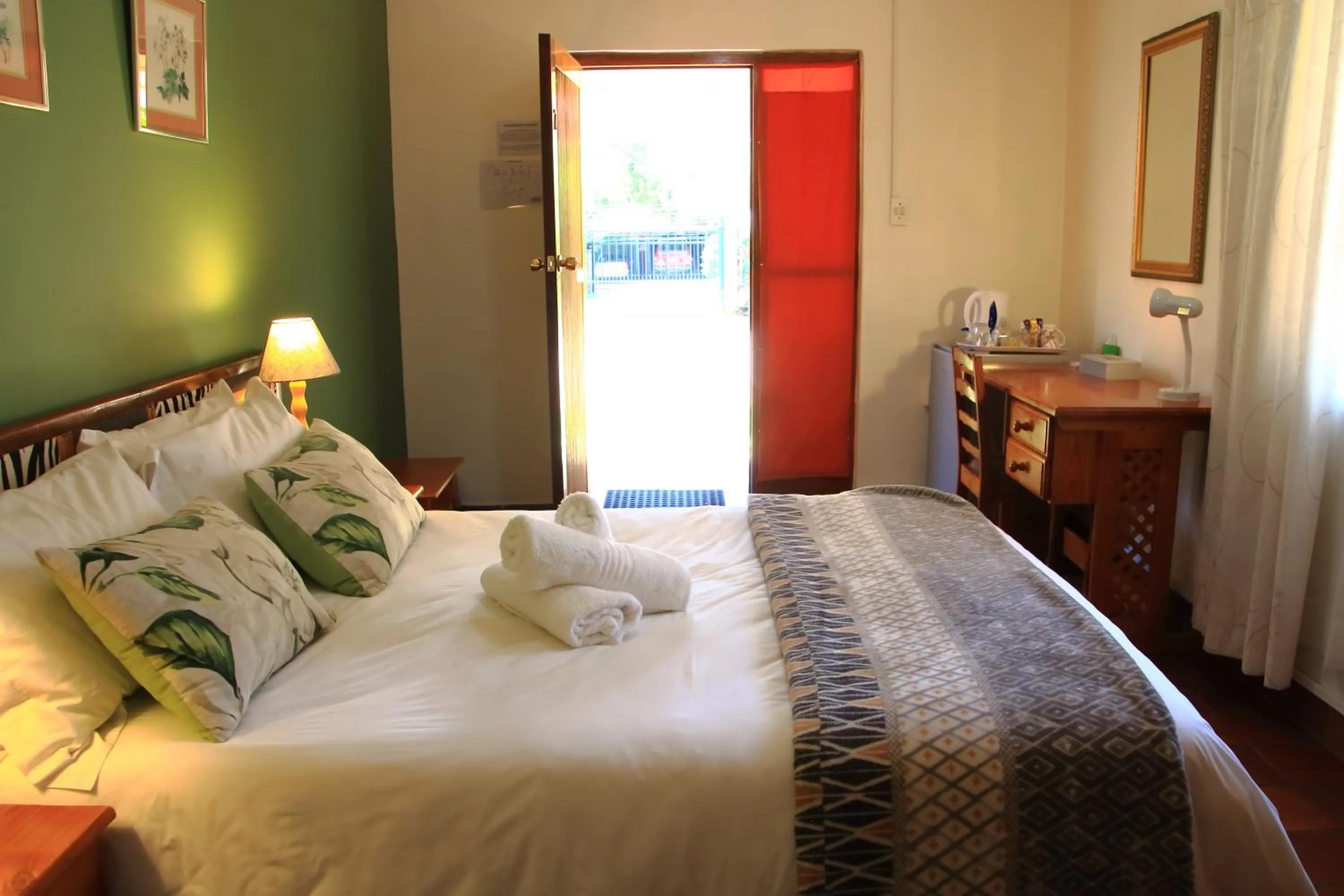 Bed in Rozendal Guest House