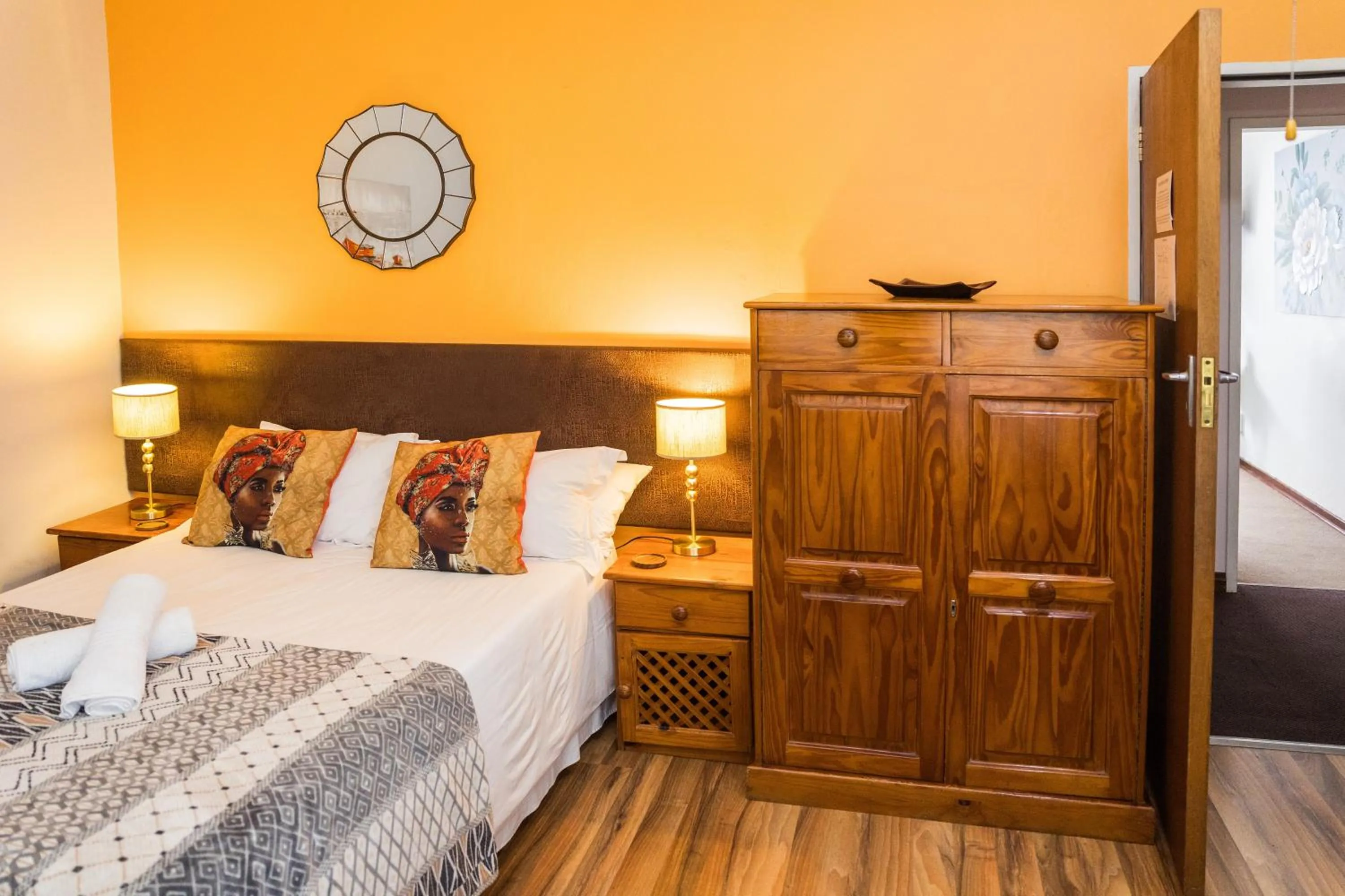 Bed in Rozendal Guest House