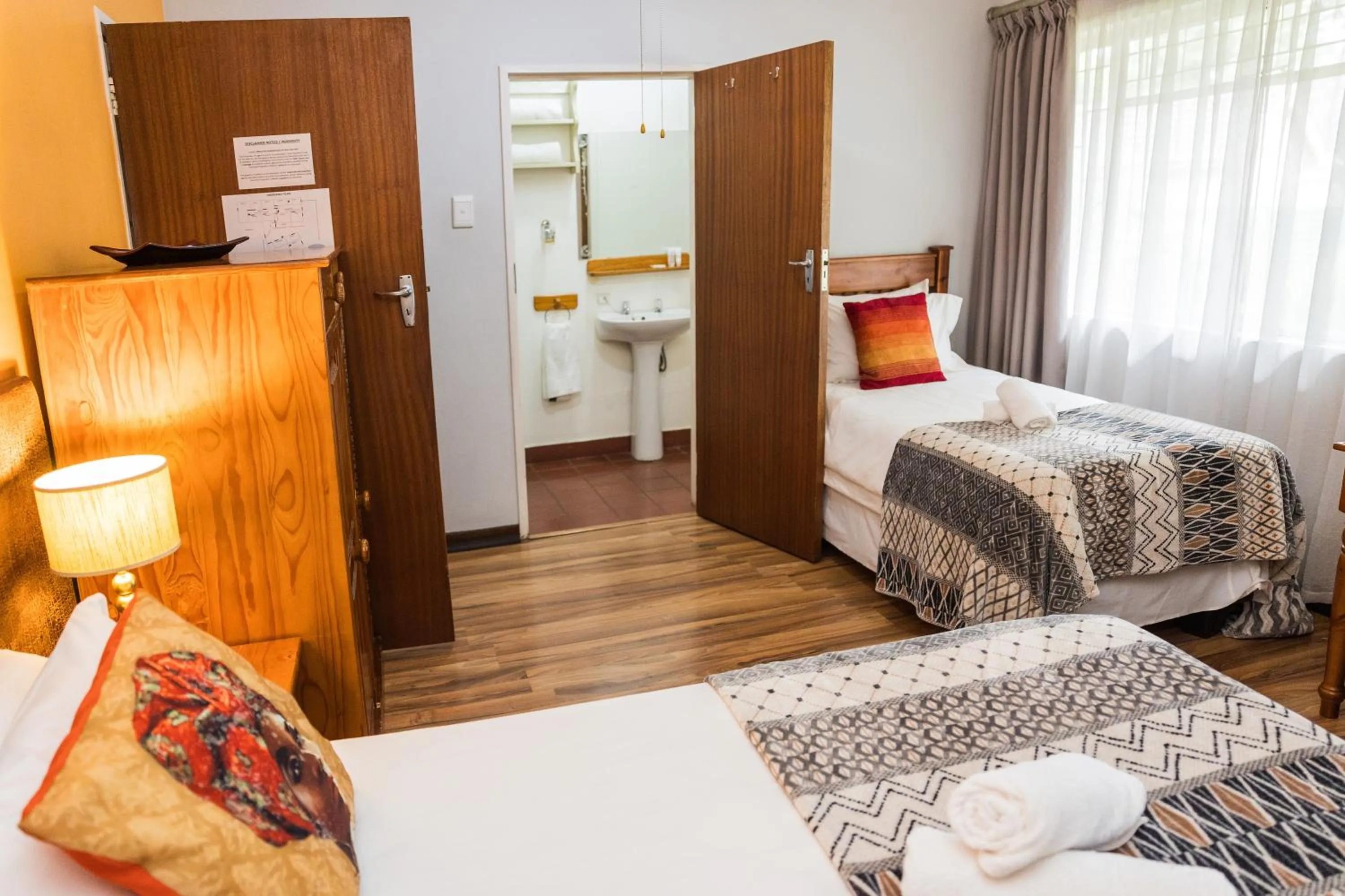 Bed in Rozendal Guest House