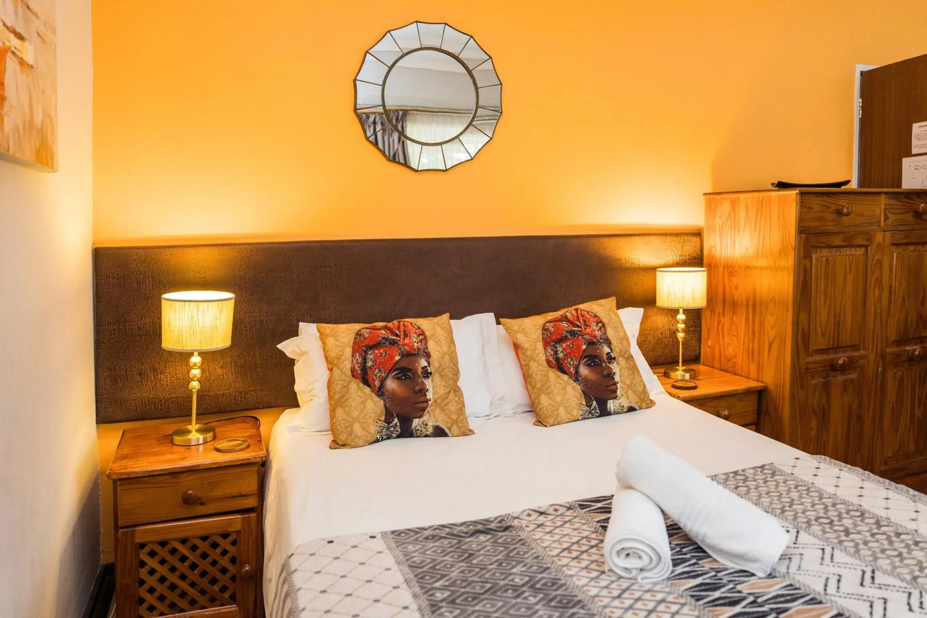 Bed in Rozendal Guest House