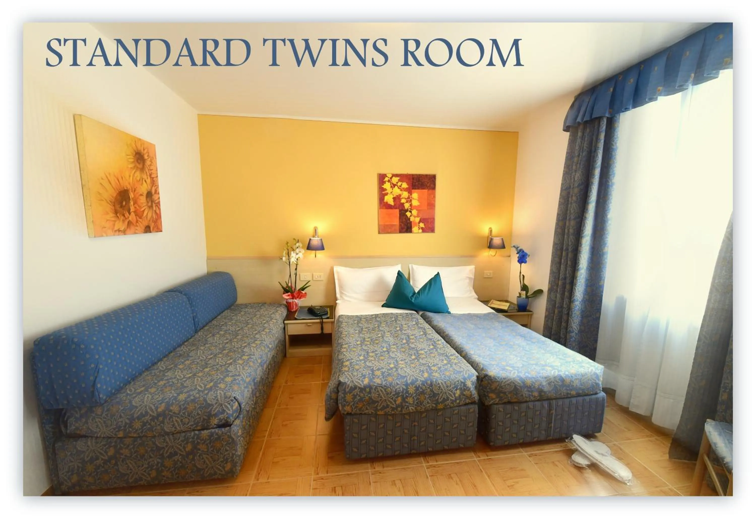 Bed in Hotel Beau Sejour