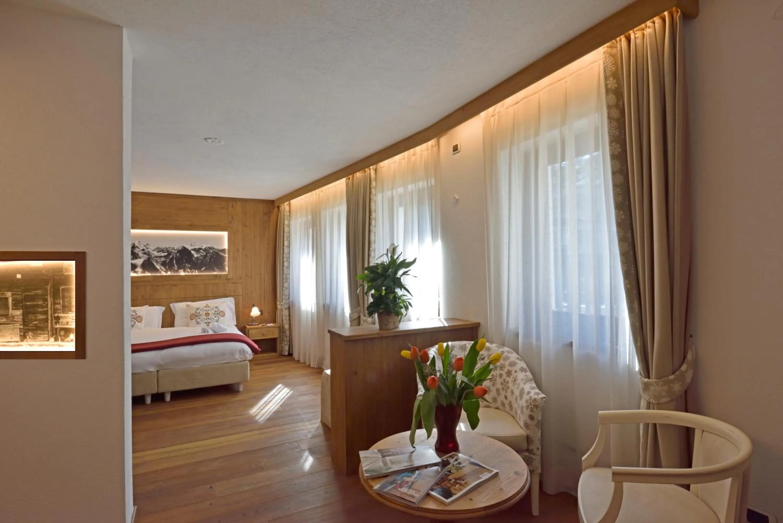 Bed in Hotel Beau Sejour