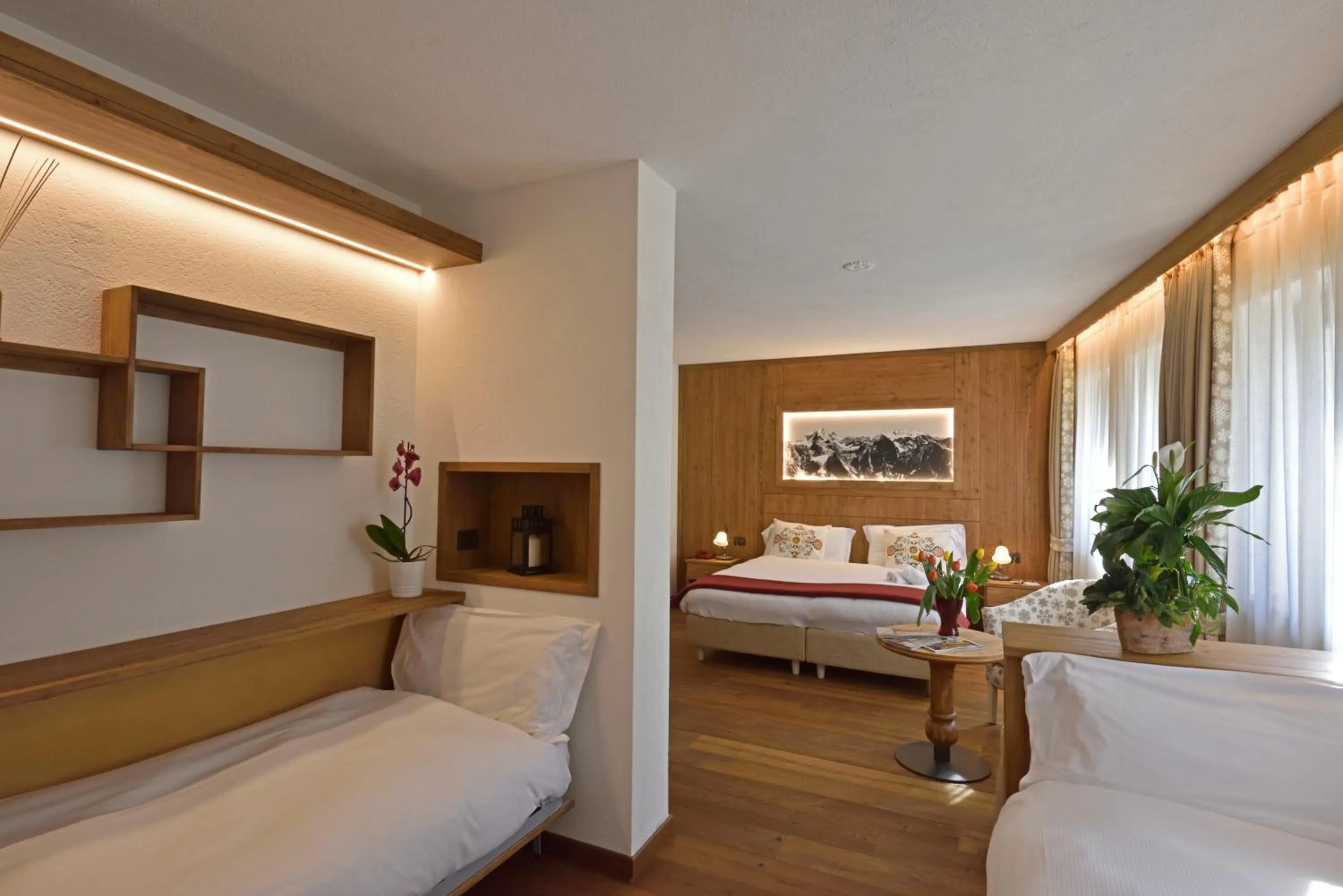 Bed in Hotel Beau Sejour