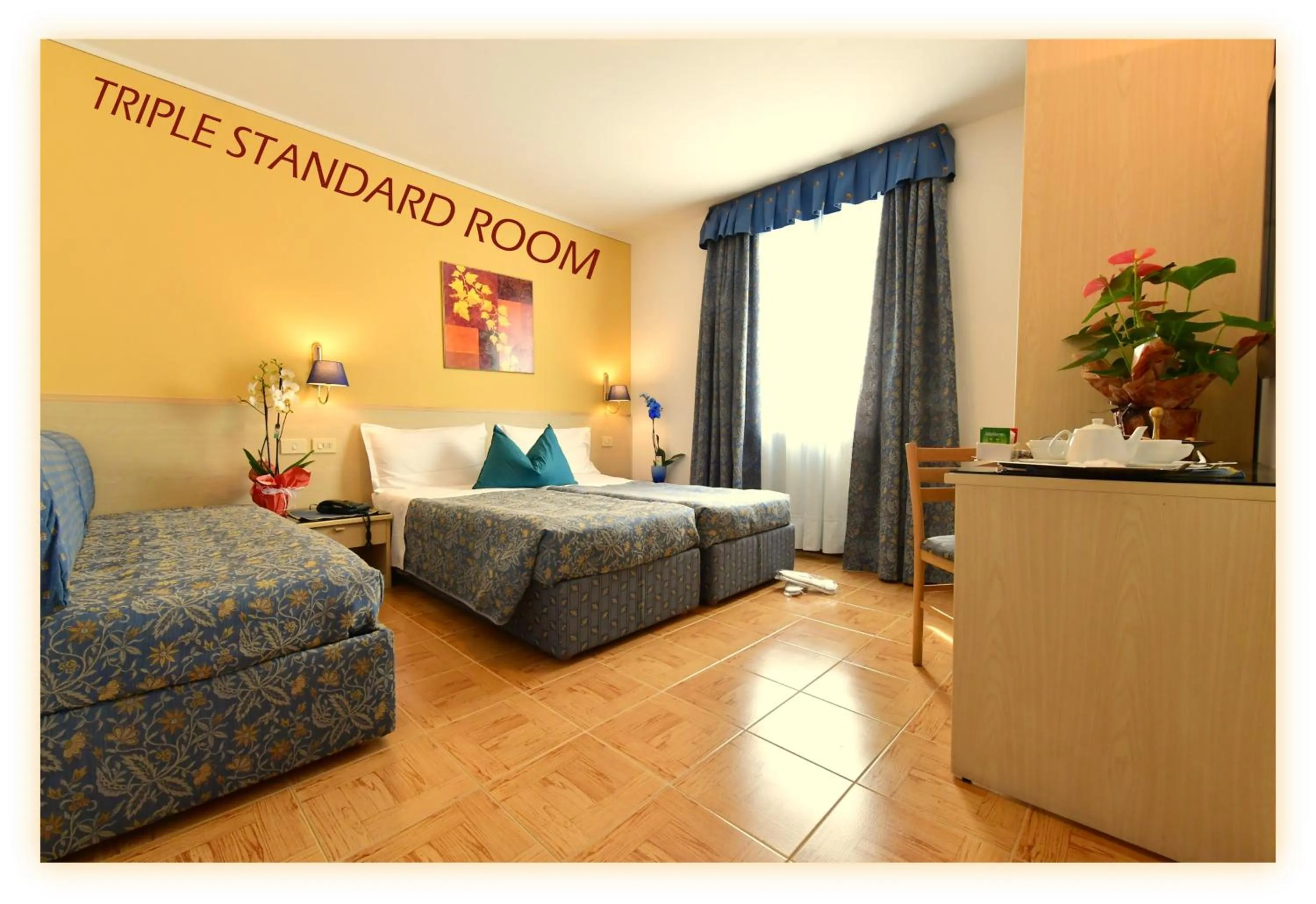 Bed in Hotel Beau Sejour