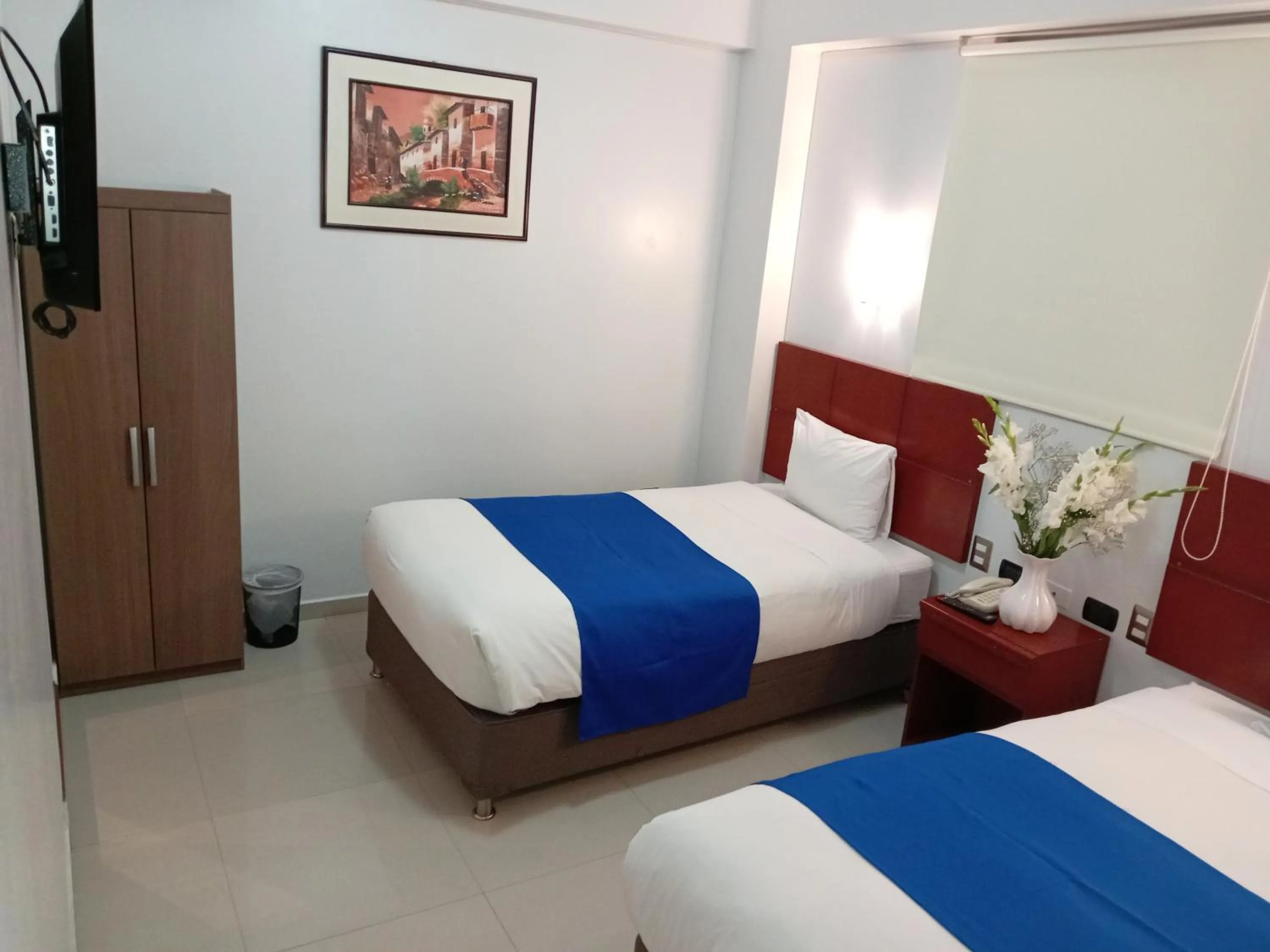 Bed in Aqua Hotel Cusco