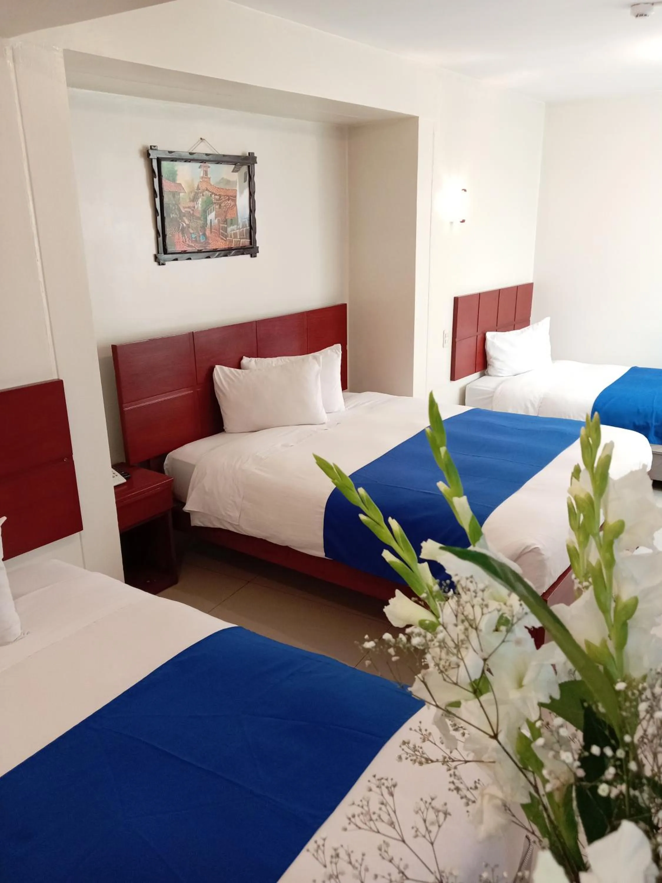 Bed in Aqua Hotel Cusco