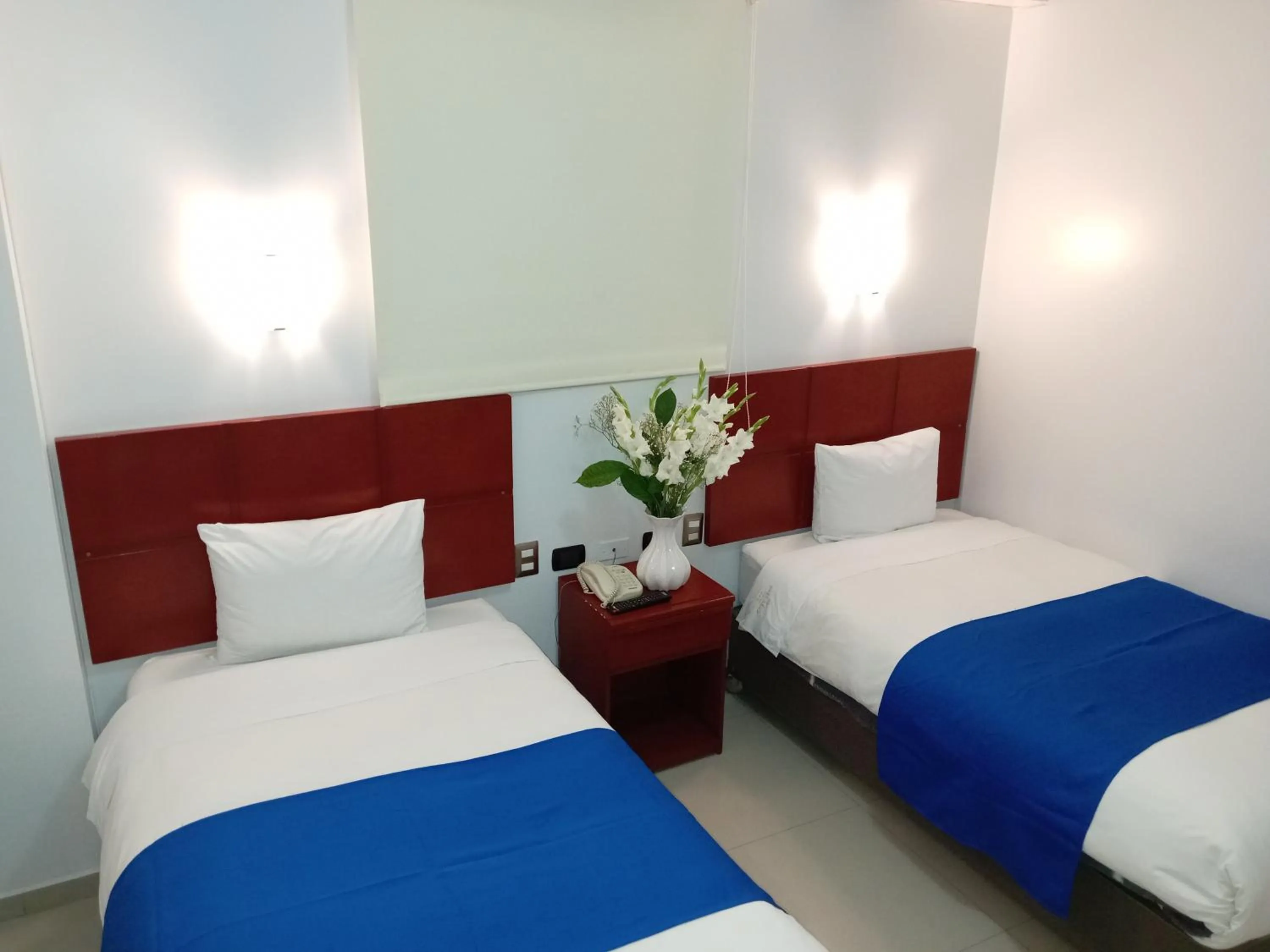 Bed in Aqua Hotel Cusco