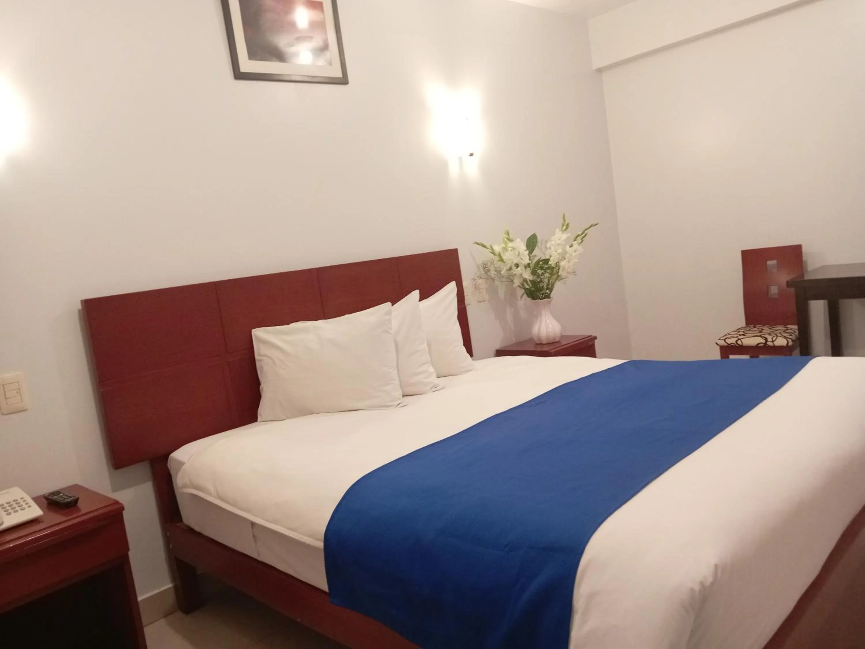 Bed in Aqua Hotel Cusco