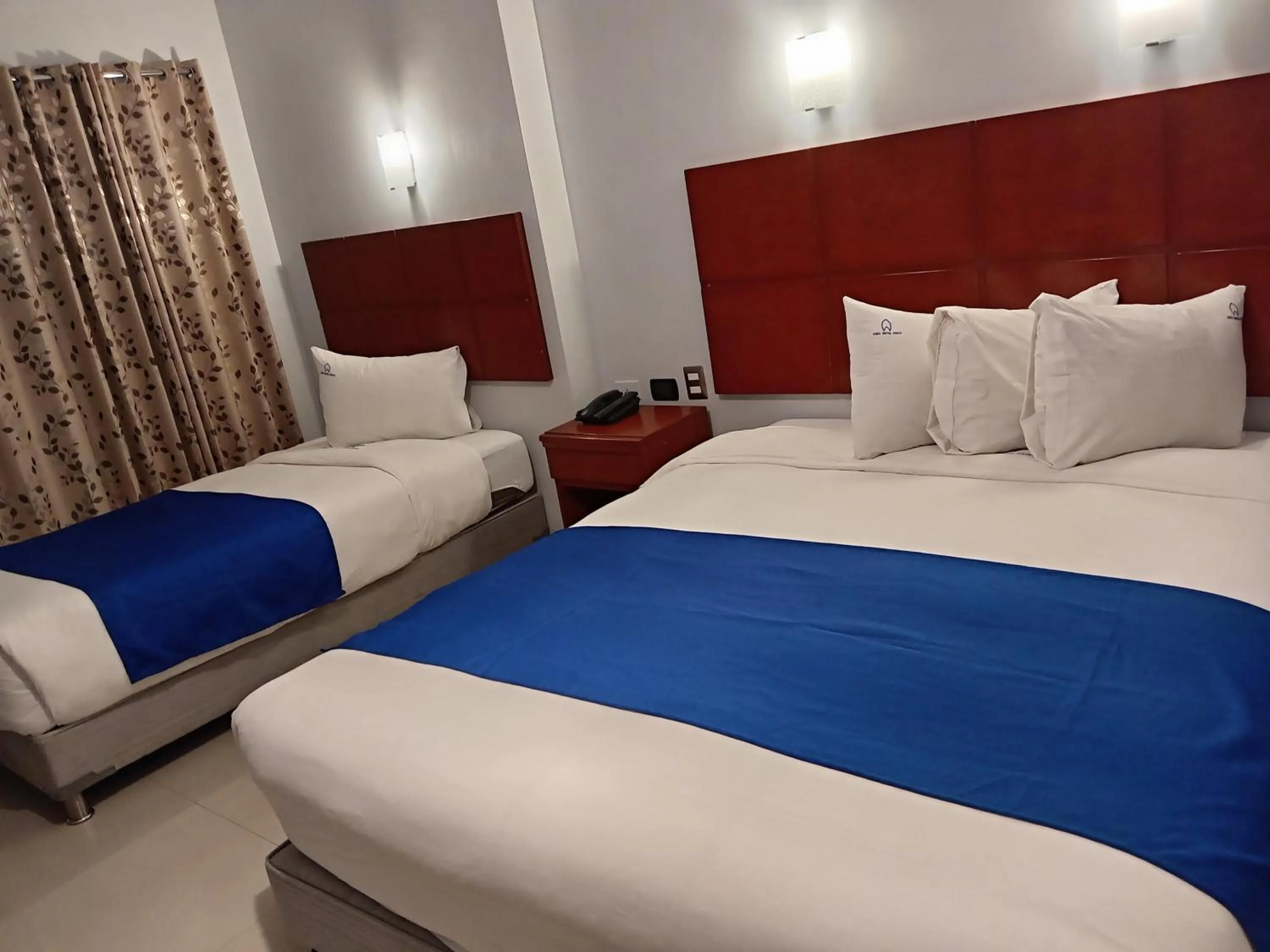 Bed in Aqua Hotel Cusco