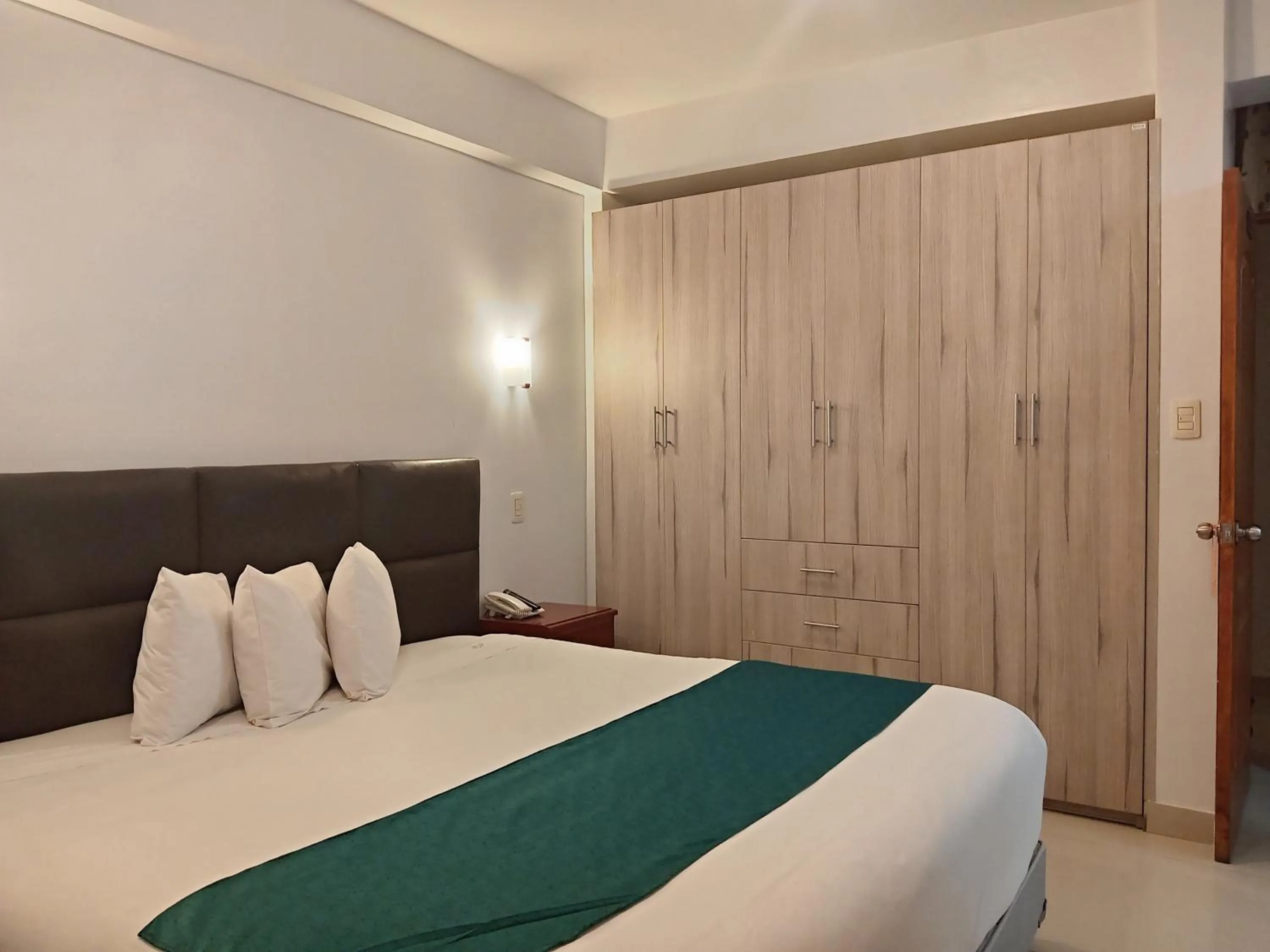 Bed in Aqua Hotel Cusco