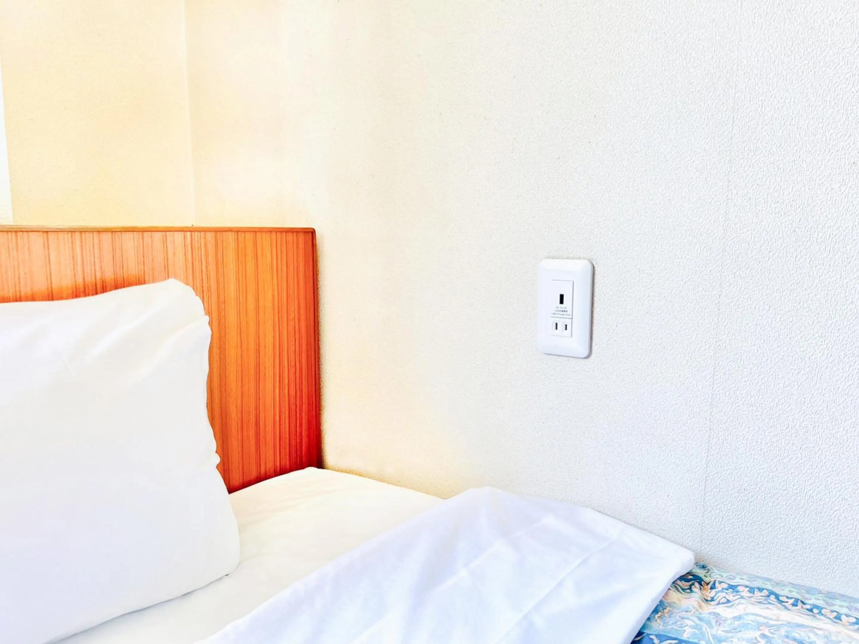 Photo of the whole room, Bed in Station Business Hotel Tenshukaku