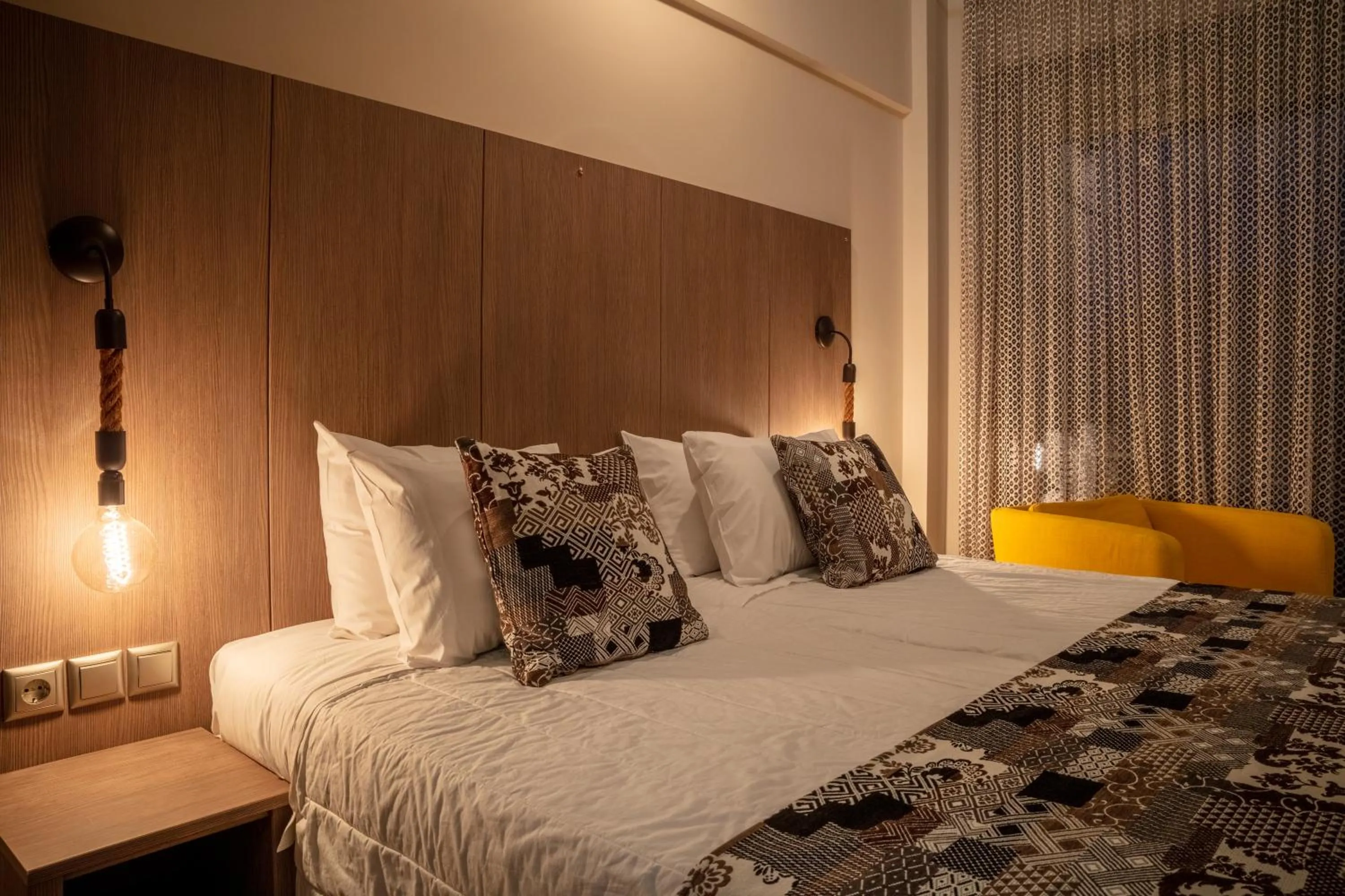 Bed in Royalty Suites Seaside