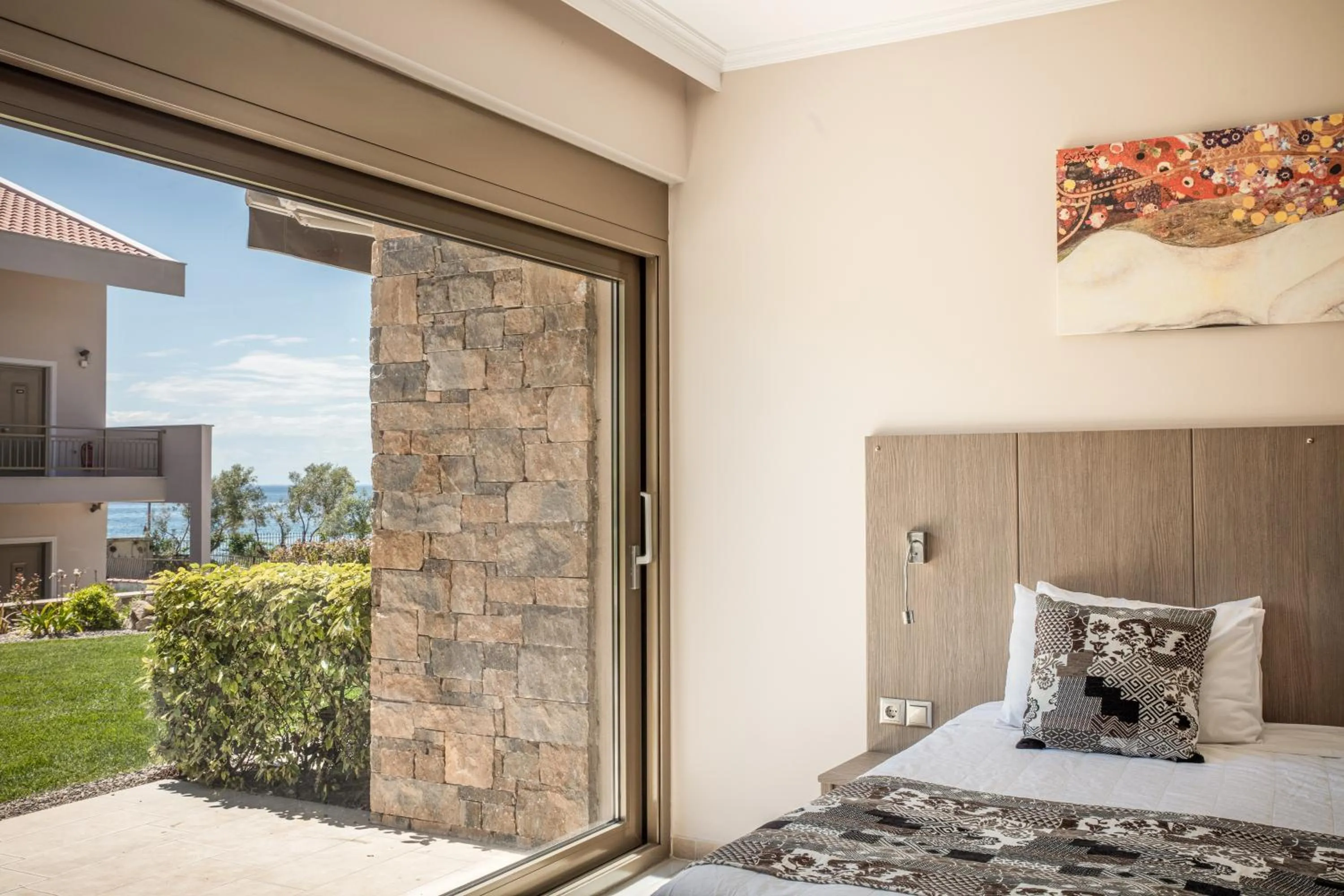 Bed in Royalty Suites Seaside