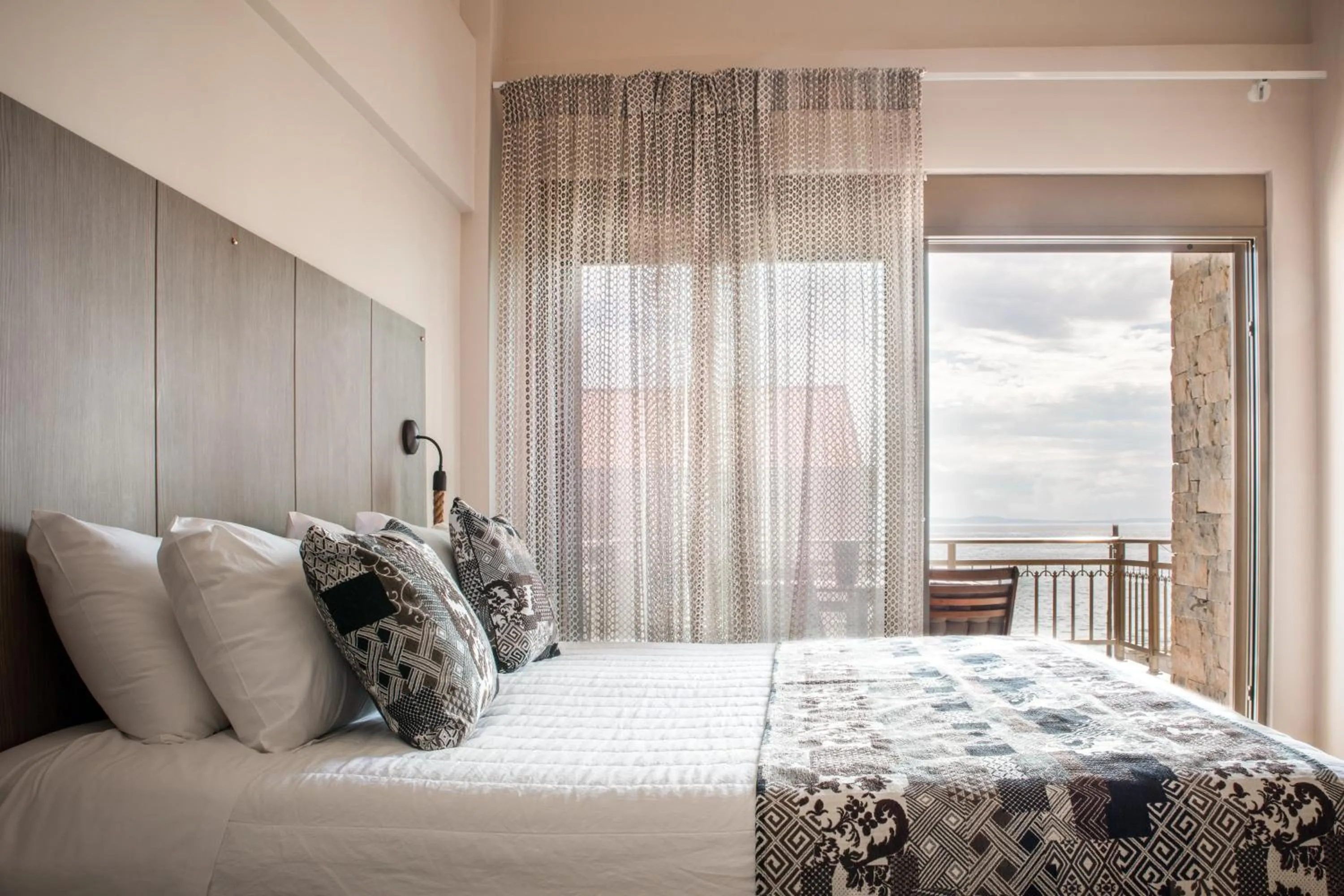 Bed in Royalty Suites Seaside