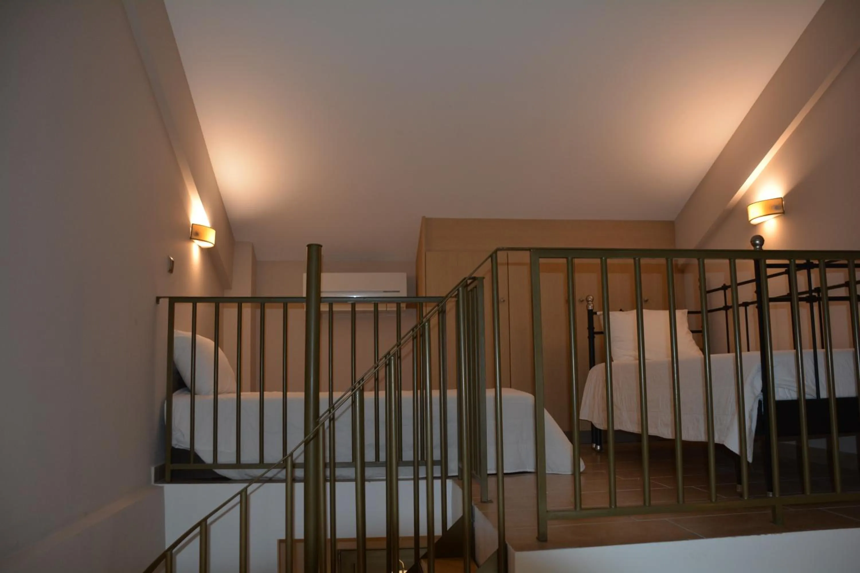 Bed in Royalty Suites Seaside