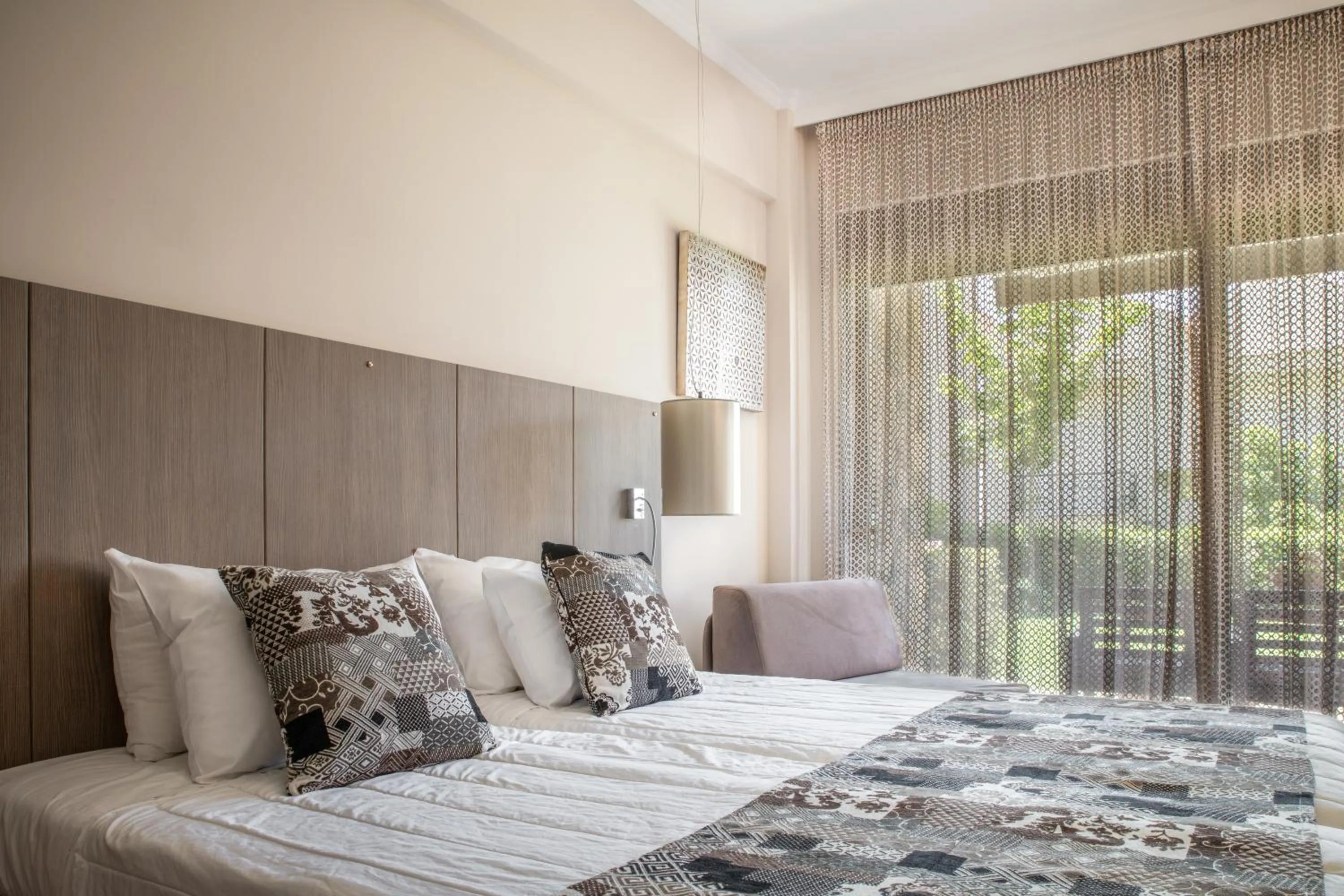 Bed in Royalty Suites Seaside