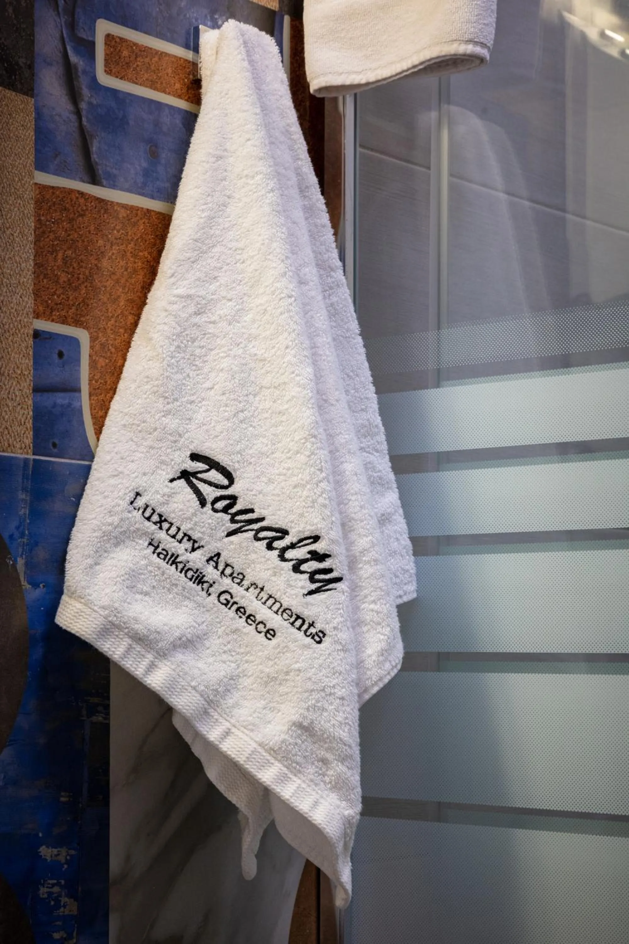 Property logo or sign in Royalty Suites Seaside