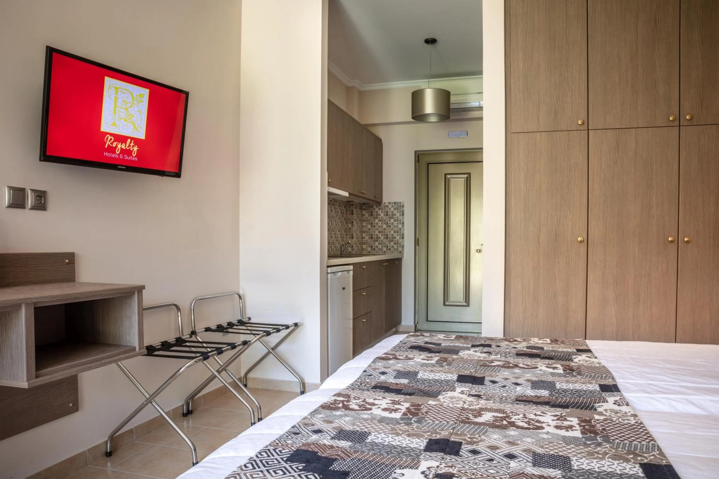 Bed in Royalty Suites Seaside