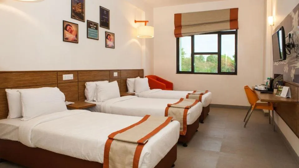 Bedroom, Bed in Max Hotels Jabalpur