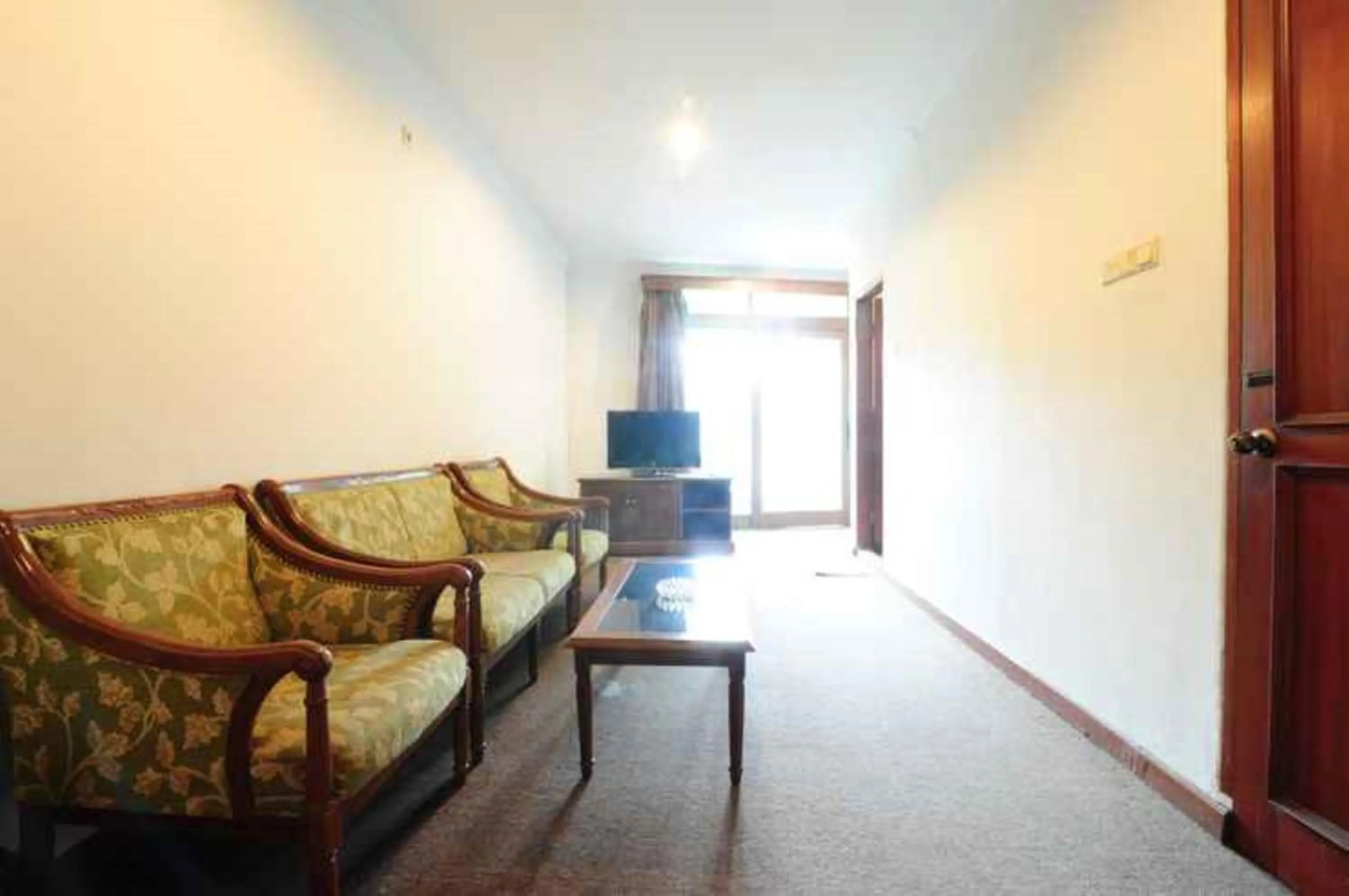 Living room in De'Qur Hotel Bandung