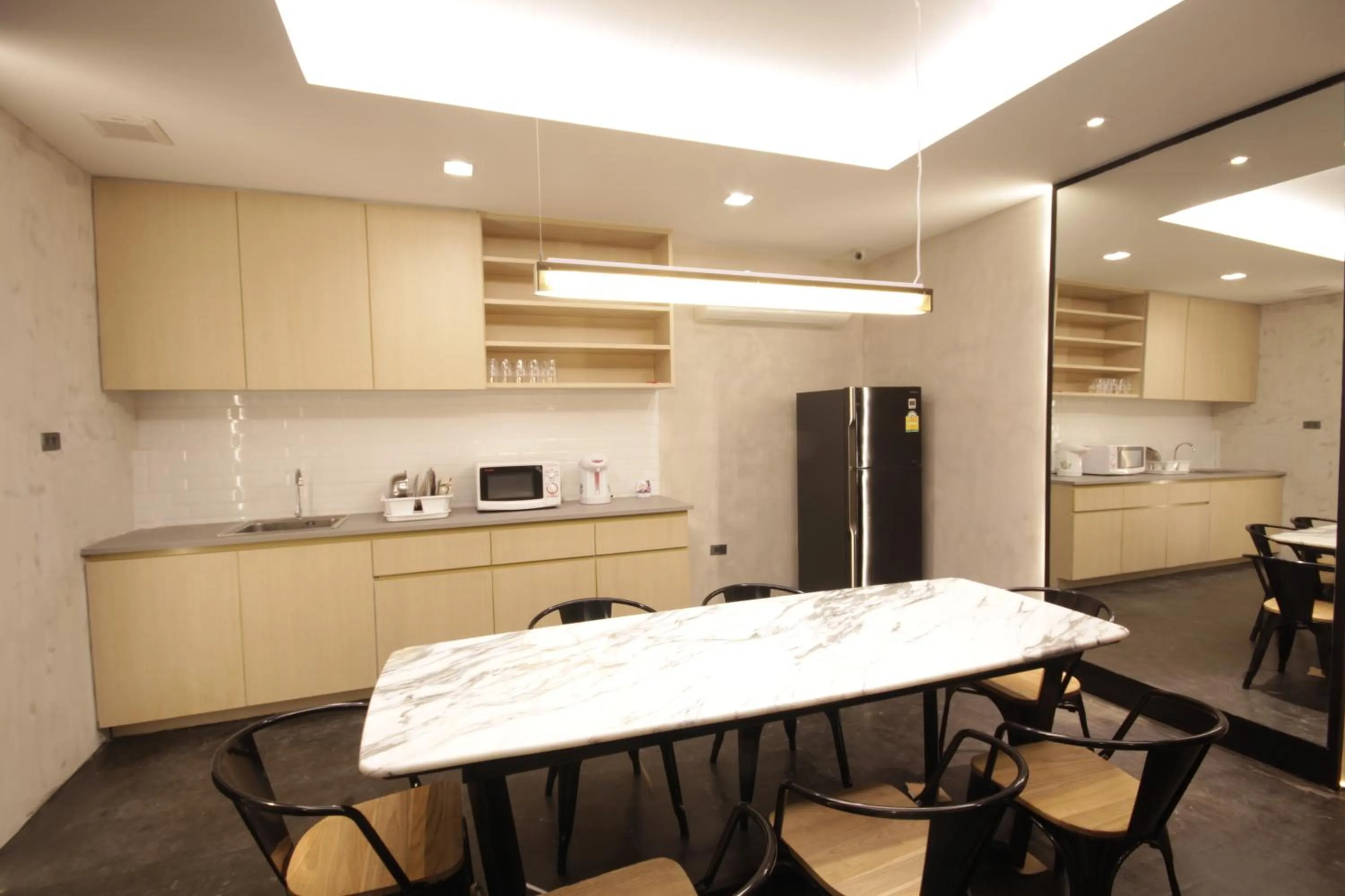 Communal kitchen in Cazz Hostel