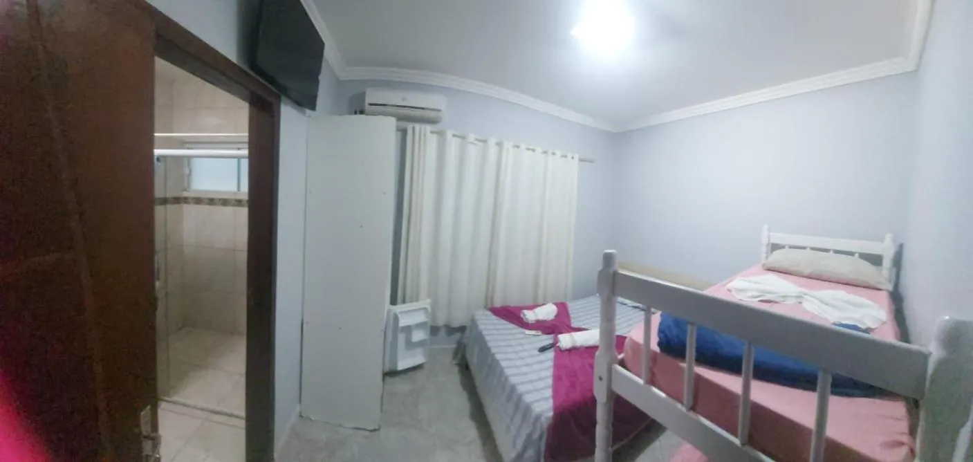 Bed in Pousada Ilha do Itacolomi Com Piscina Proximo do Beto Carrero