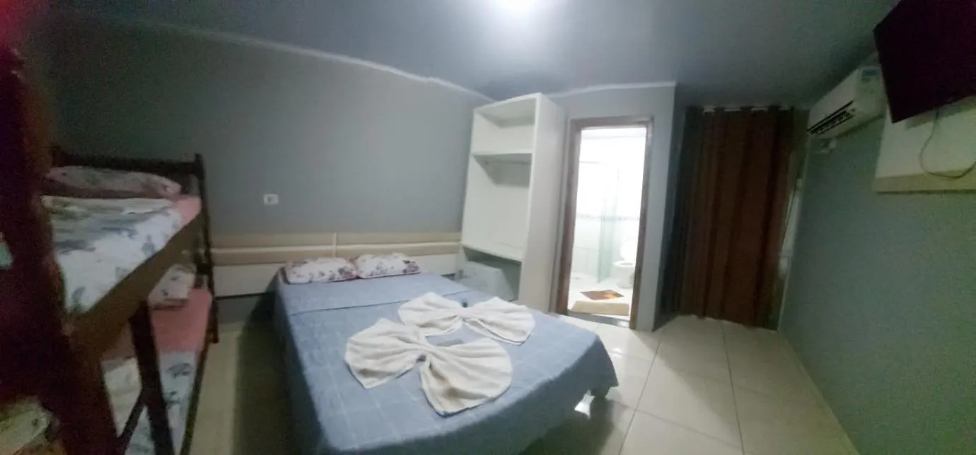 Bed in Pousada Ilha do Itacolomi Com Piscina Proximo do Beto Carrero